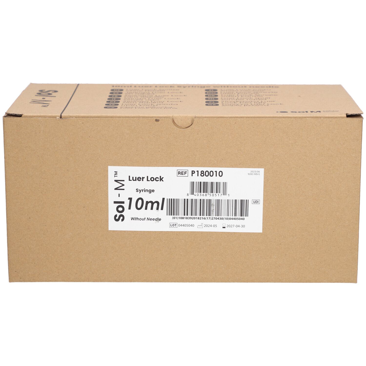 Kartonverpackung mit Etikett. Aufschrift: Luer Lock, 10ml, Sol-M. Barcode und Referenznummer.