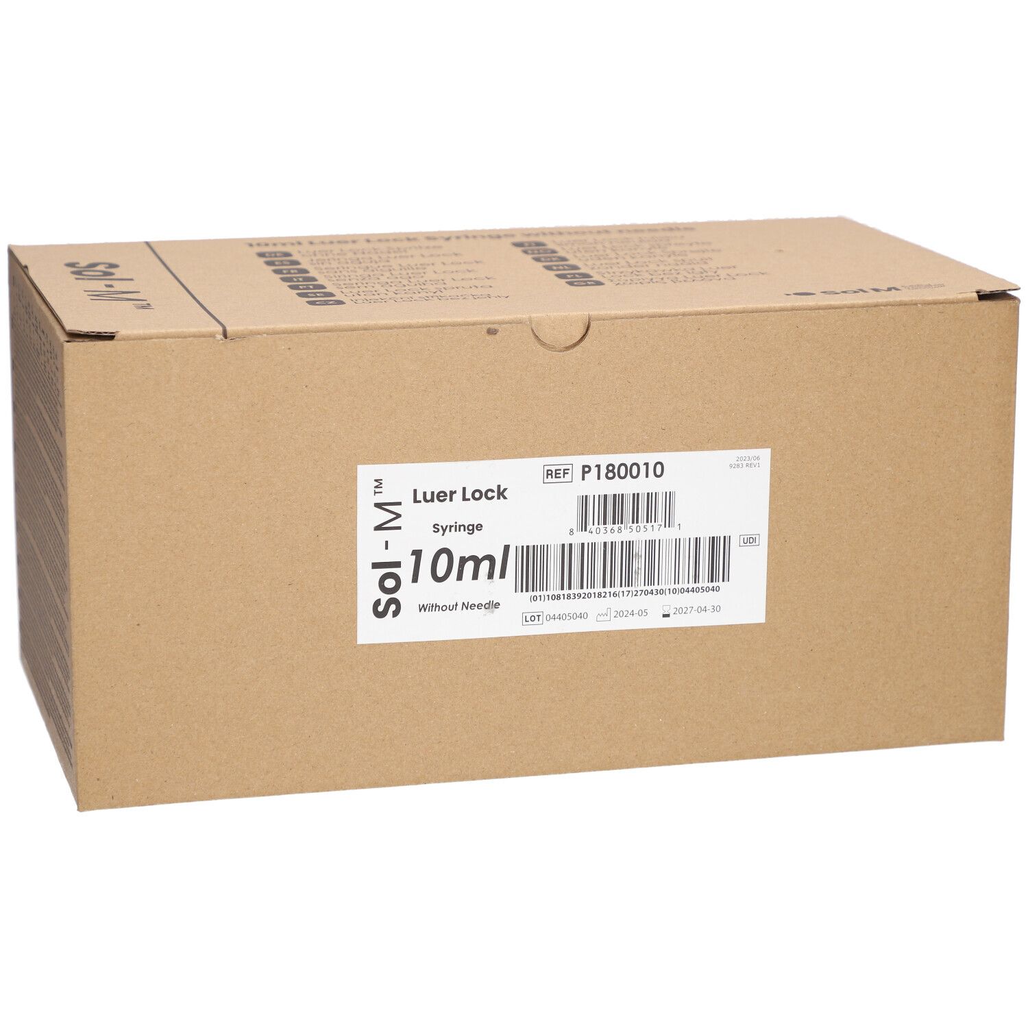 Kartonverpackung mit Etikett. Aufschrift: Luer Lock, 10ml, Sol-M. Barcode und Referenznummer.