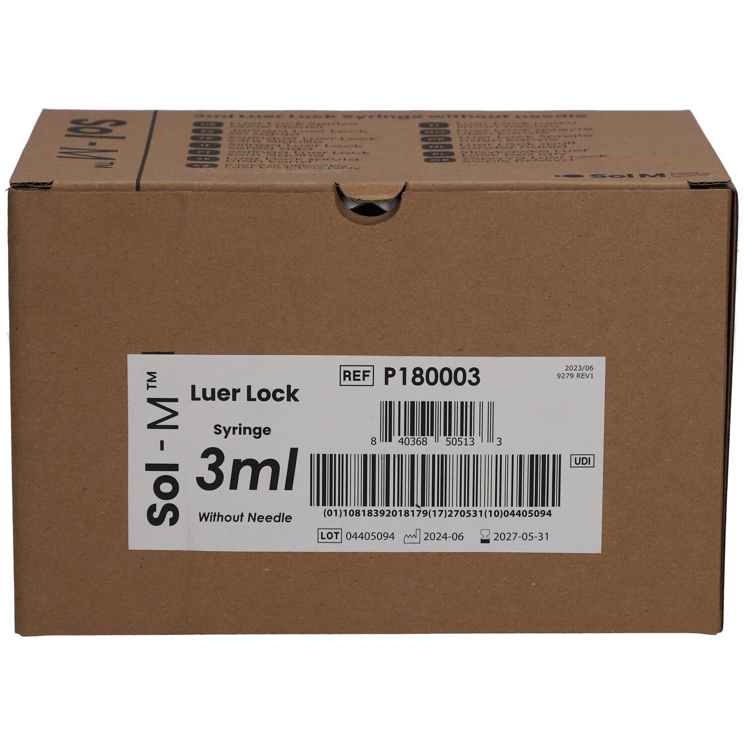 Karton mit Sol-M® Spritzen. Aufkleber mit Produktinformationen: 3 ml Luer Lock, steril, ohne Nadel.