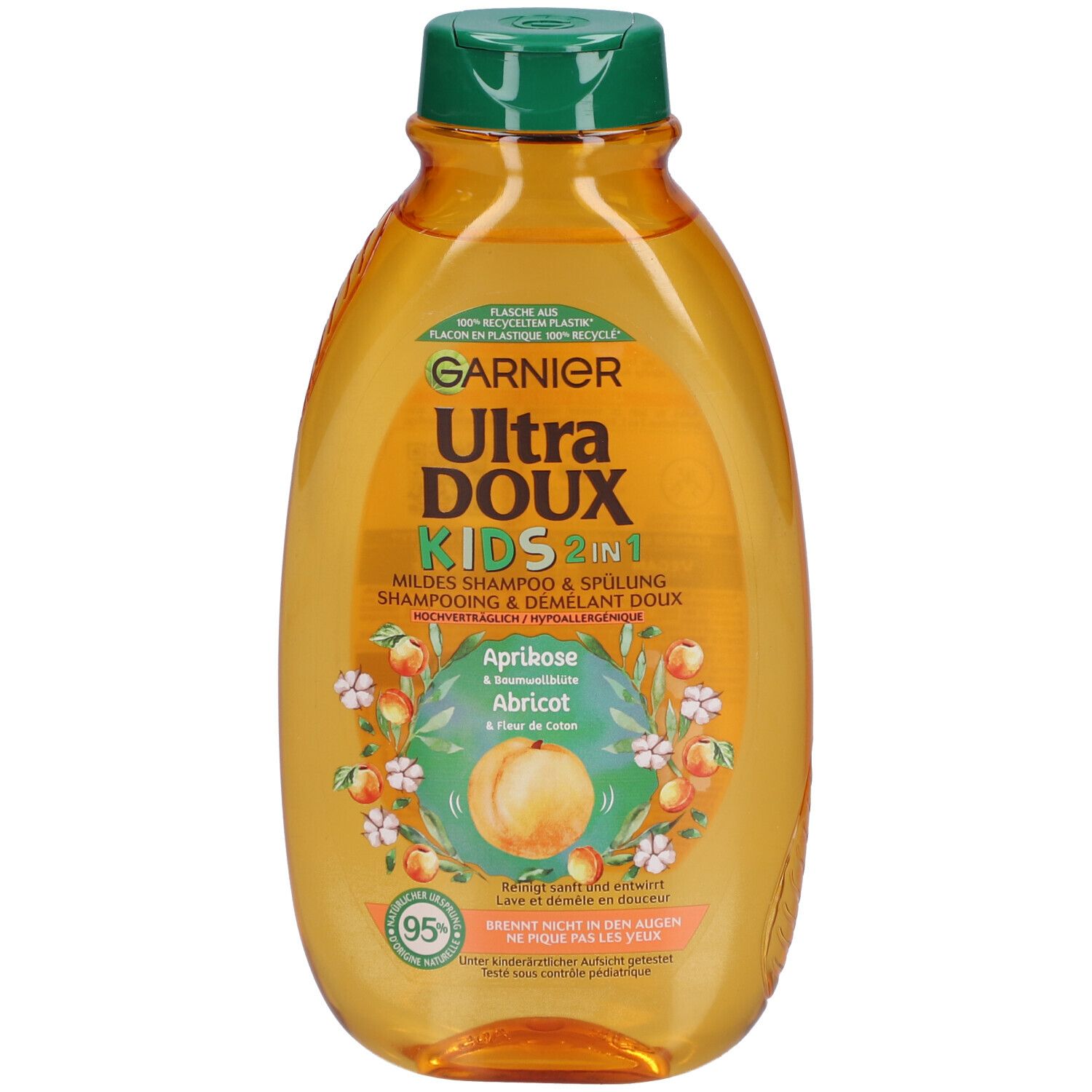 Garnier Ultra Doux Kids 2in1 Shampoo, Aprikose und Baumwollblüte. Orangefarbene Flasche mit grünem Deckel. Produktetikett.