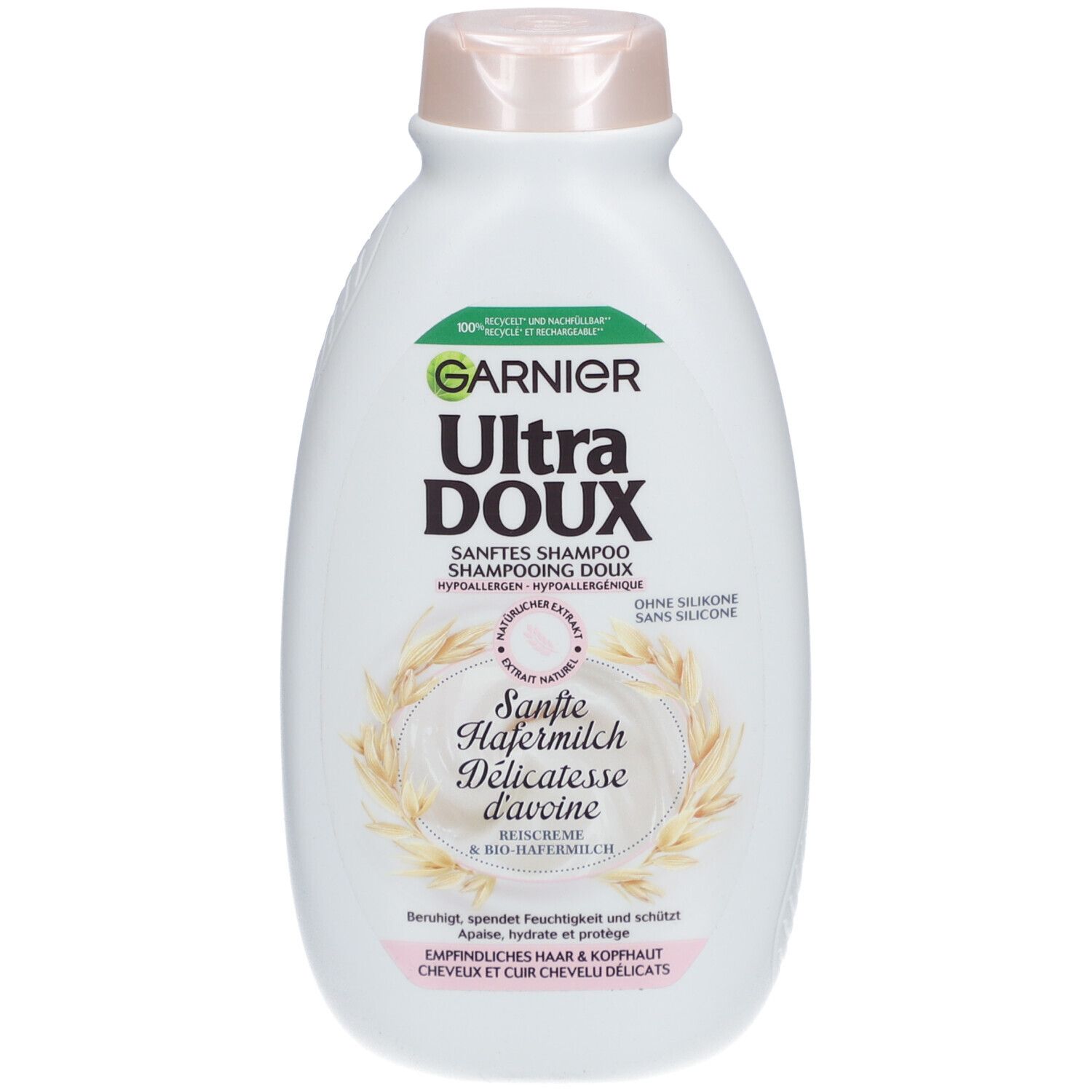 Weiße Flasche mit rosafarbenem Deckel. Aufschrift: GARNIER Ultra DOUX SANFTES SHAMPOO. Mit Hafermilch-Extrakt. Für empfindliches Haar.