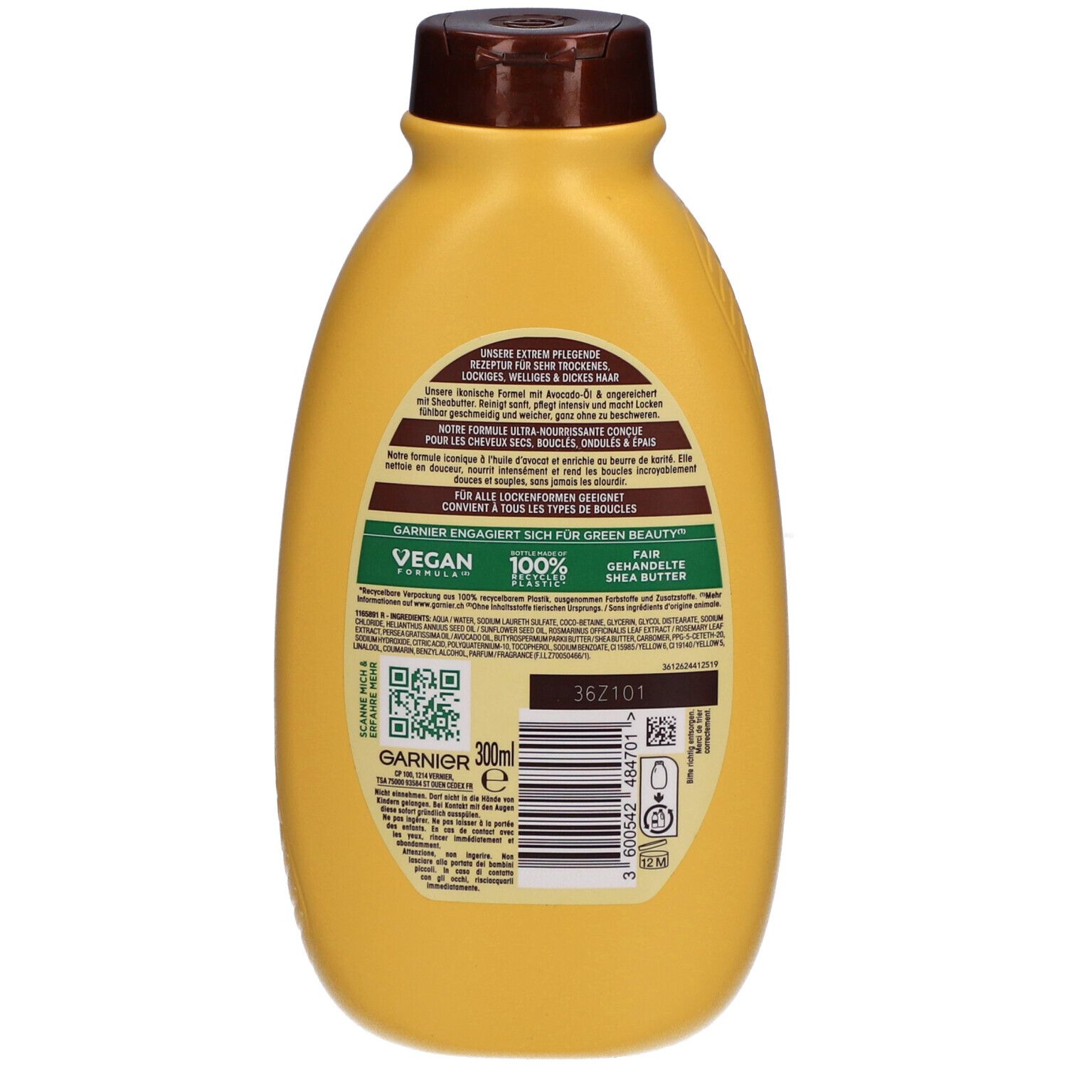Dos d'un flacon jaune. Texte: GARNIER, Vegan, 100% plastique recyclé. Code QR et code-barres.
