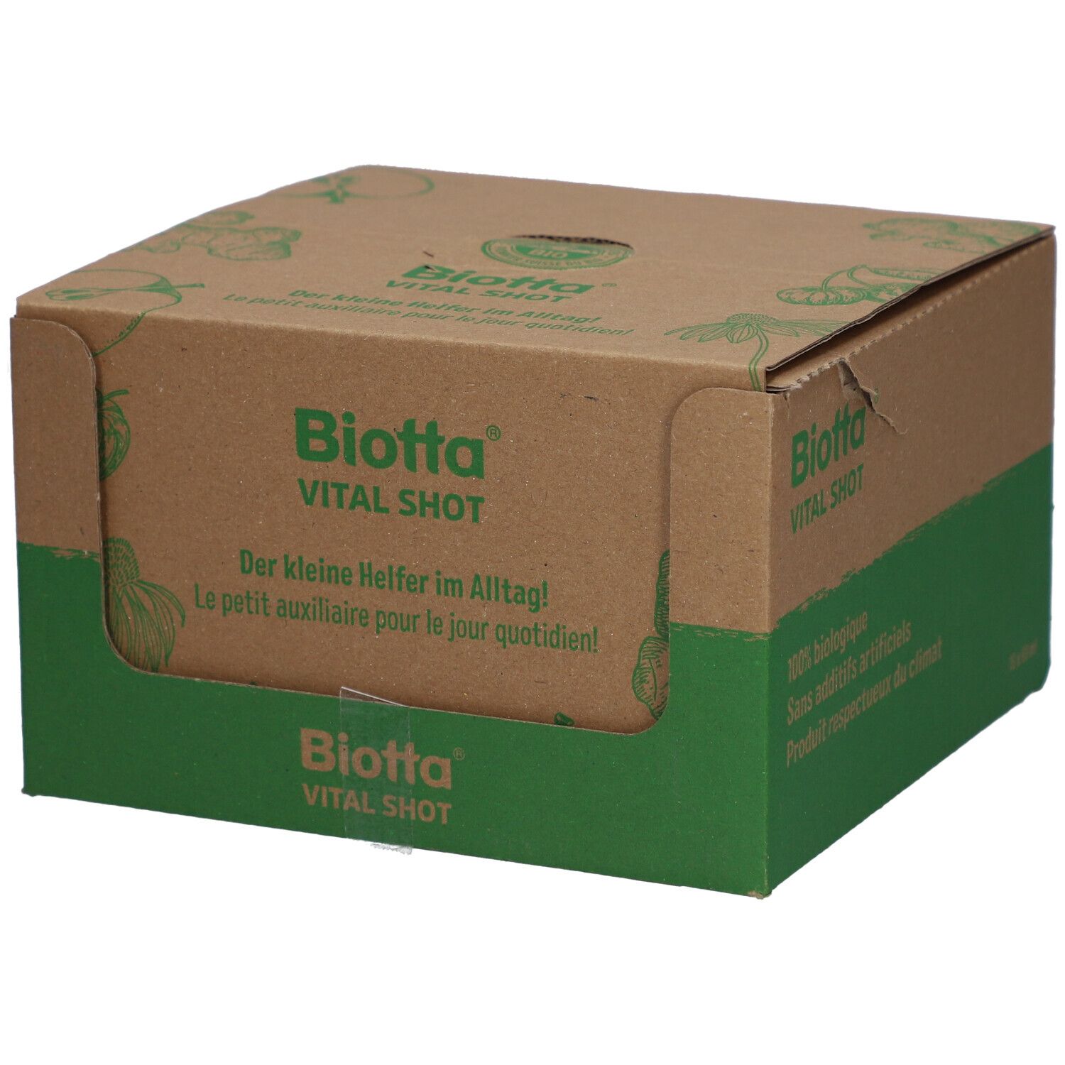 Kartonverpackung von Biotta Vital Shot. Grün-braune Farbgebung. Aufschrift: Vital Shot, Der kleine Helfer im Alltag!