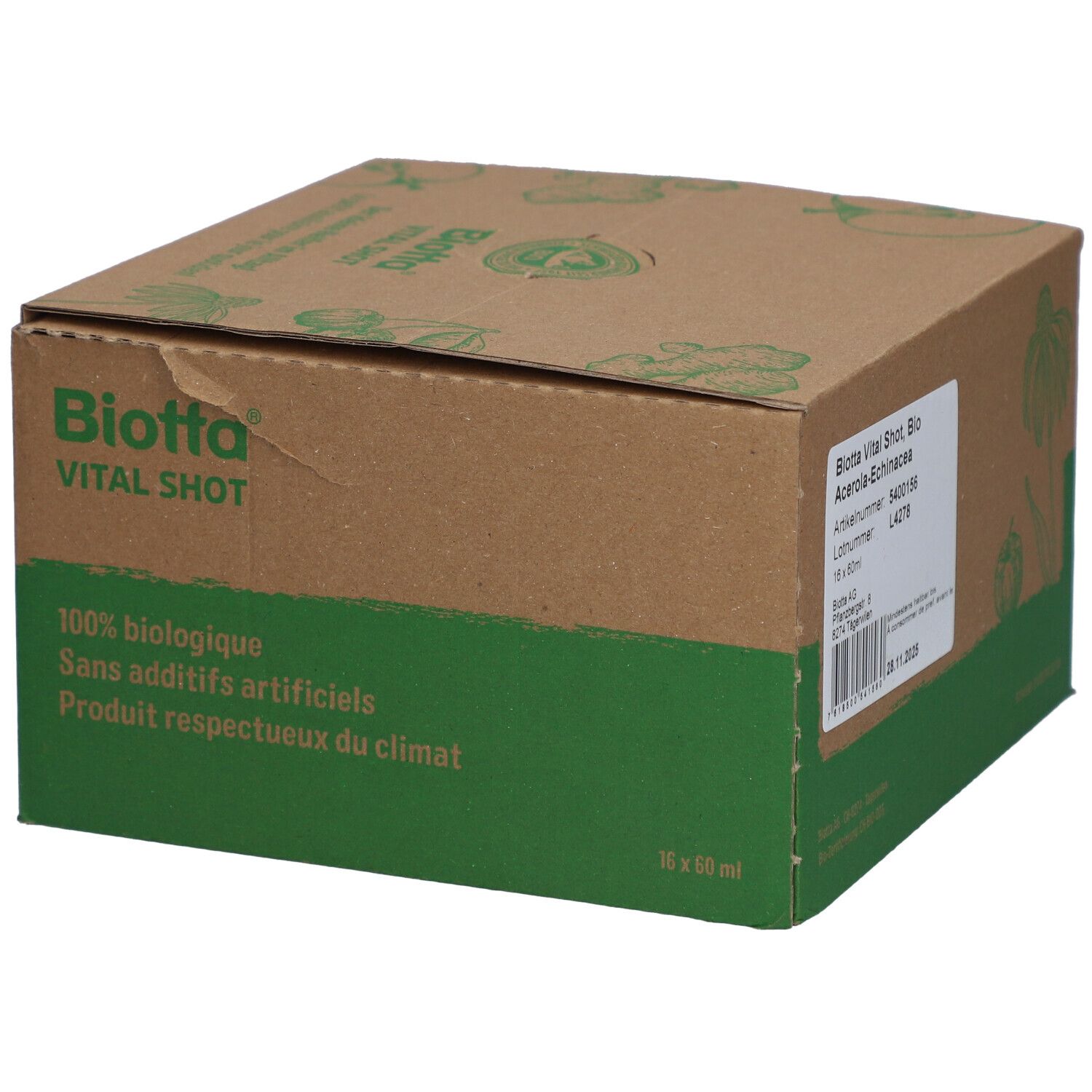 Kartonverpackung von Biotta Vital Shot. Grün-braune Farbgebung. Aufschrift: Biotta Vital Shot, 100% biologisch, Sans additifs artificiels.