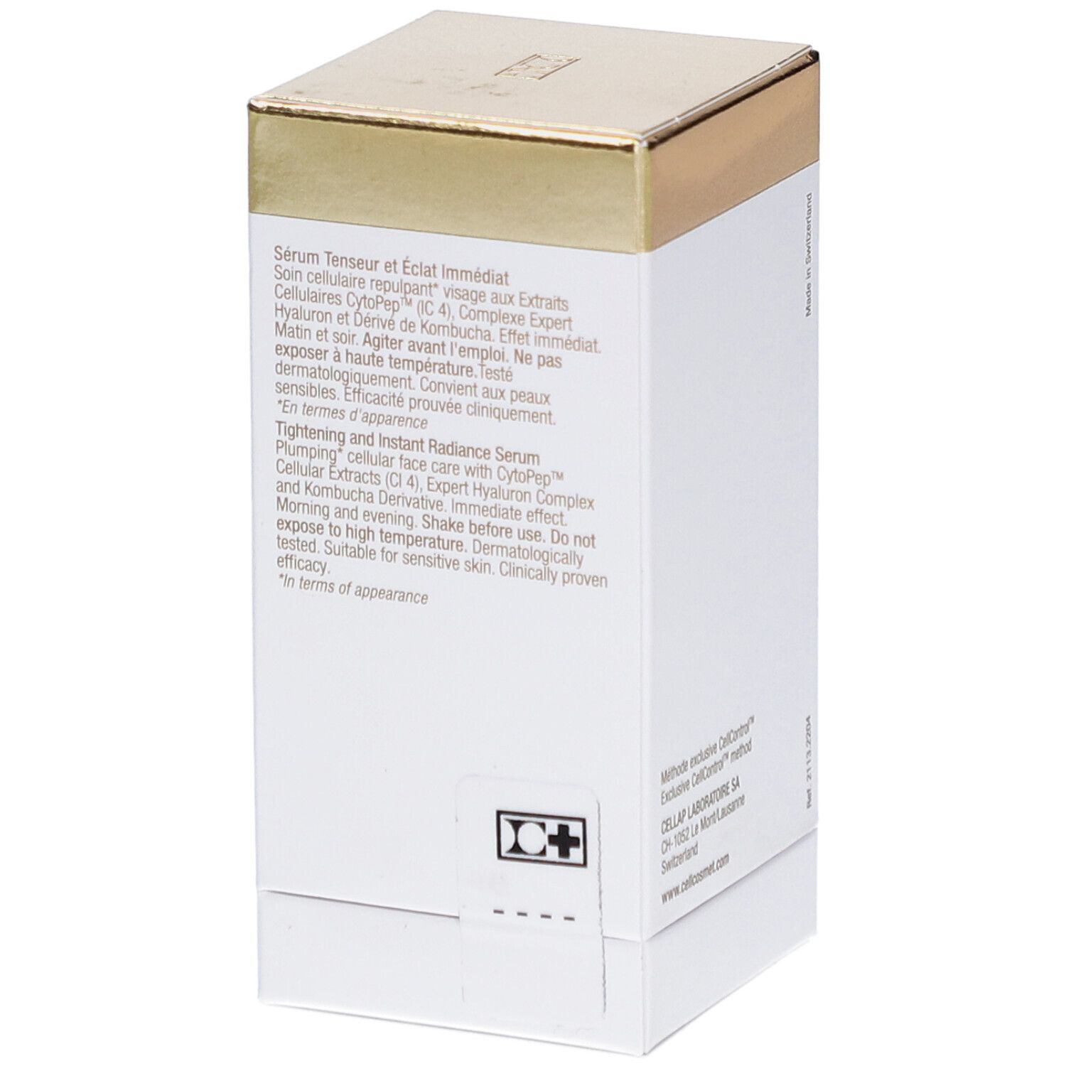 Emballage blanc avec couvercle doré. Texte en français et anglais. Contient des informations sur le produit.