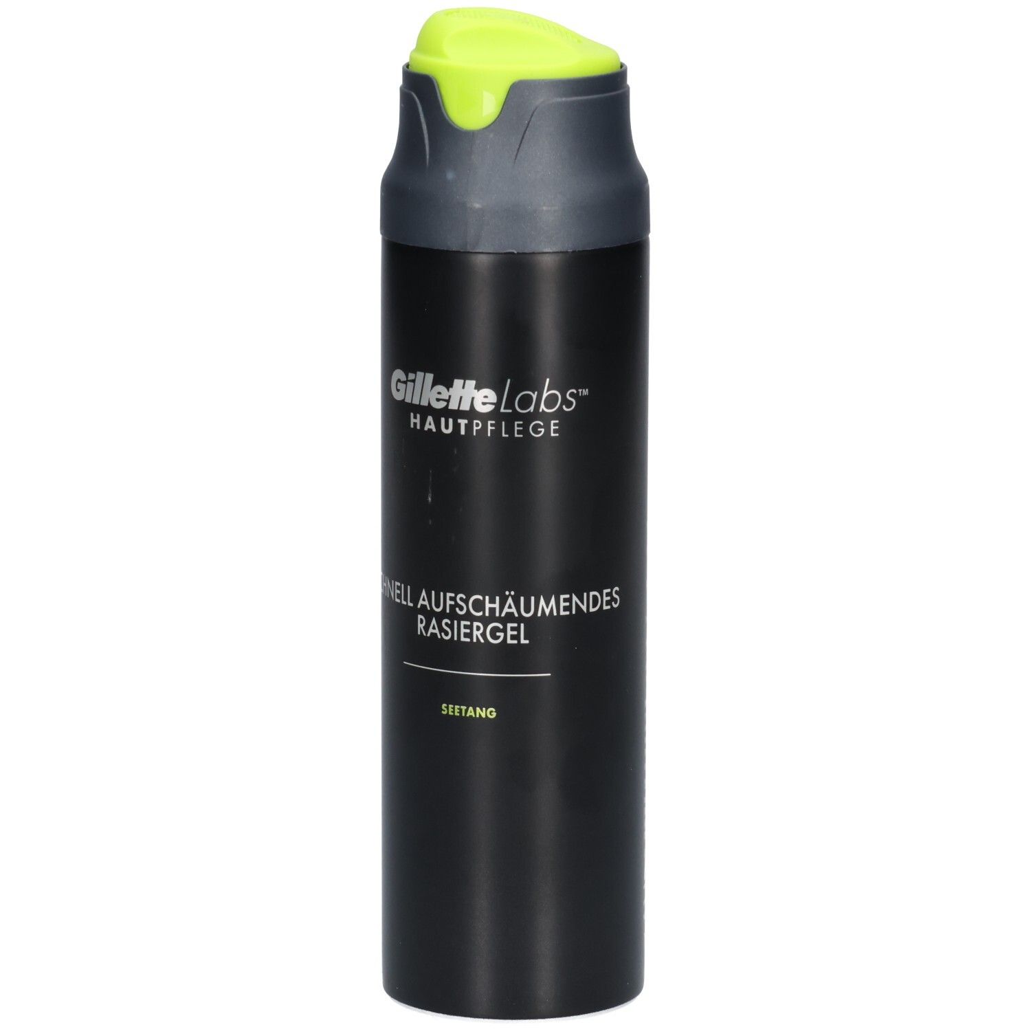 Bombe noire avec bouchon gris et tête de pulvérisation vert néon. Inscription: Gillette Labs, Soin de la peau, Gel à raser.
