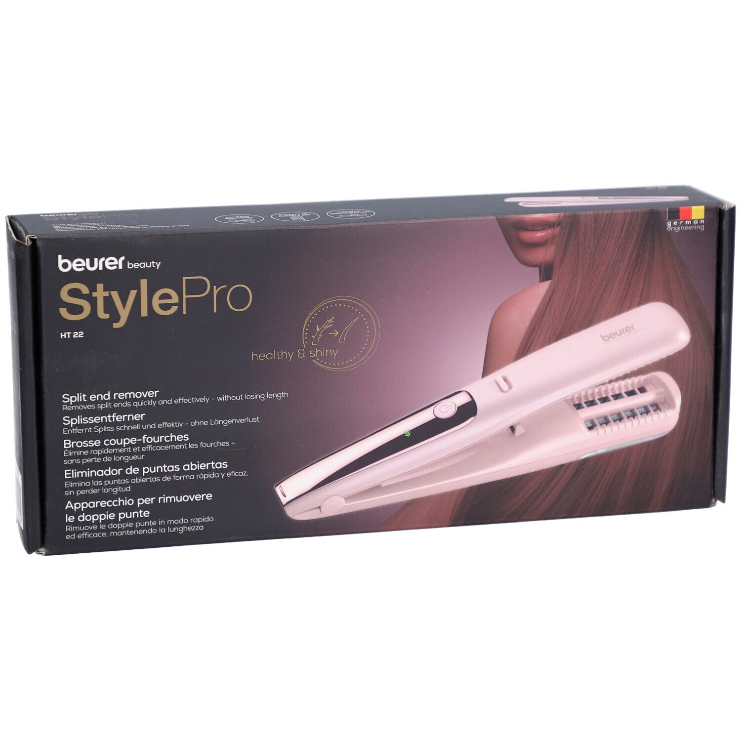 Boîte avec image du produit. Beurer StylePro HT 22. Éliminateur de pointes fourchues. Appareil rose.
