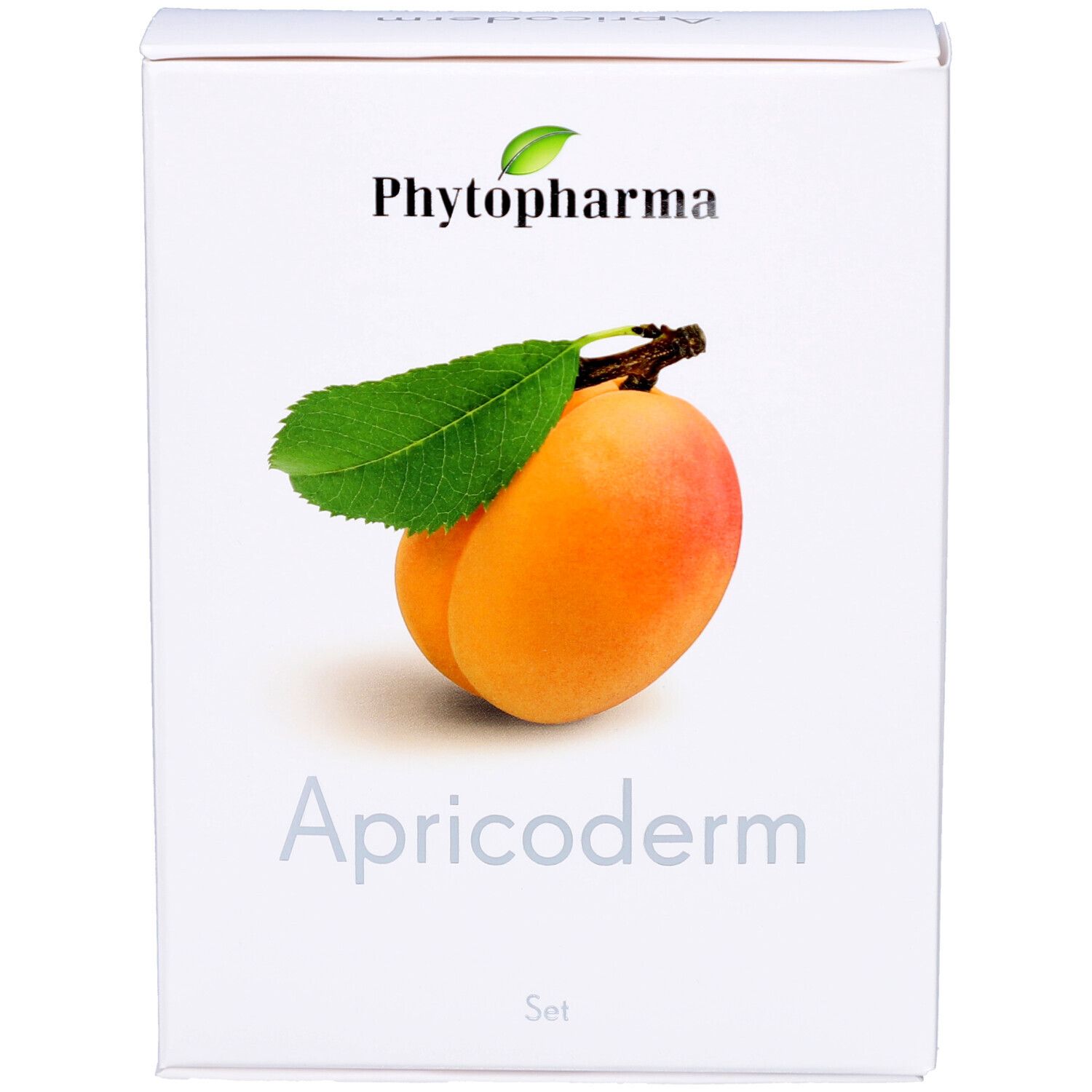Weiße Verpackung mit Logo Phytopharma und Aprikose. Schriftzug Apricoderm und Set. Frontansicht.