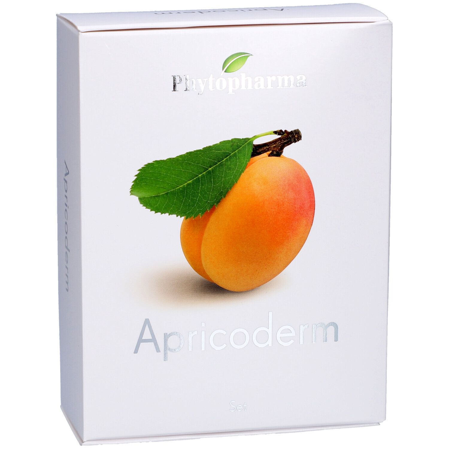 Weiße Verpackung mit Logo Phytopharma und Aprikose. Schriftzug Apricoderm und Set. Frontansicht.