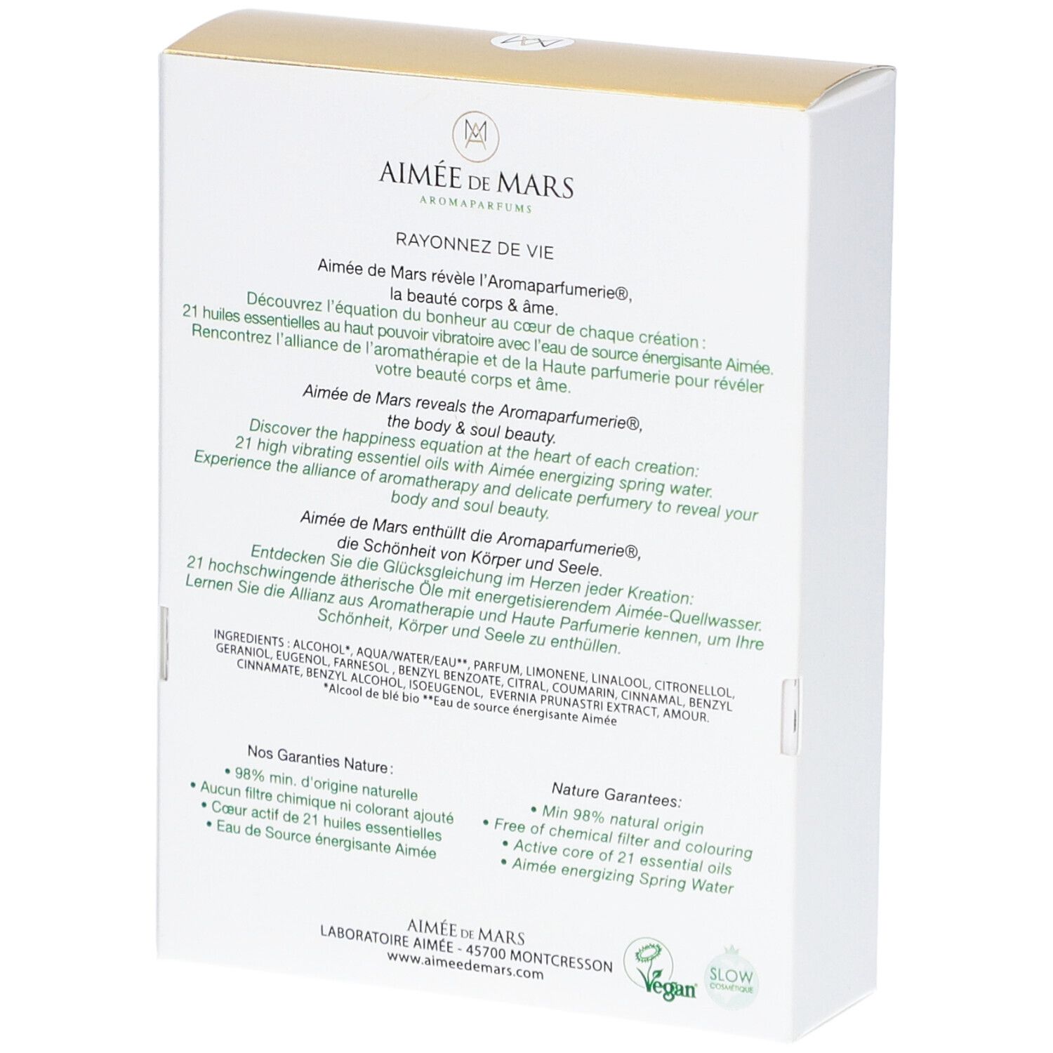 Dos de la boîte blanche. Texte multilingue. Inscription: Aimée de Mars, Rayonnez de Vie. Logo vegan.