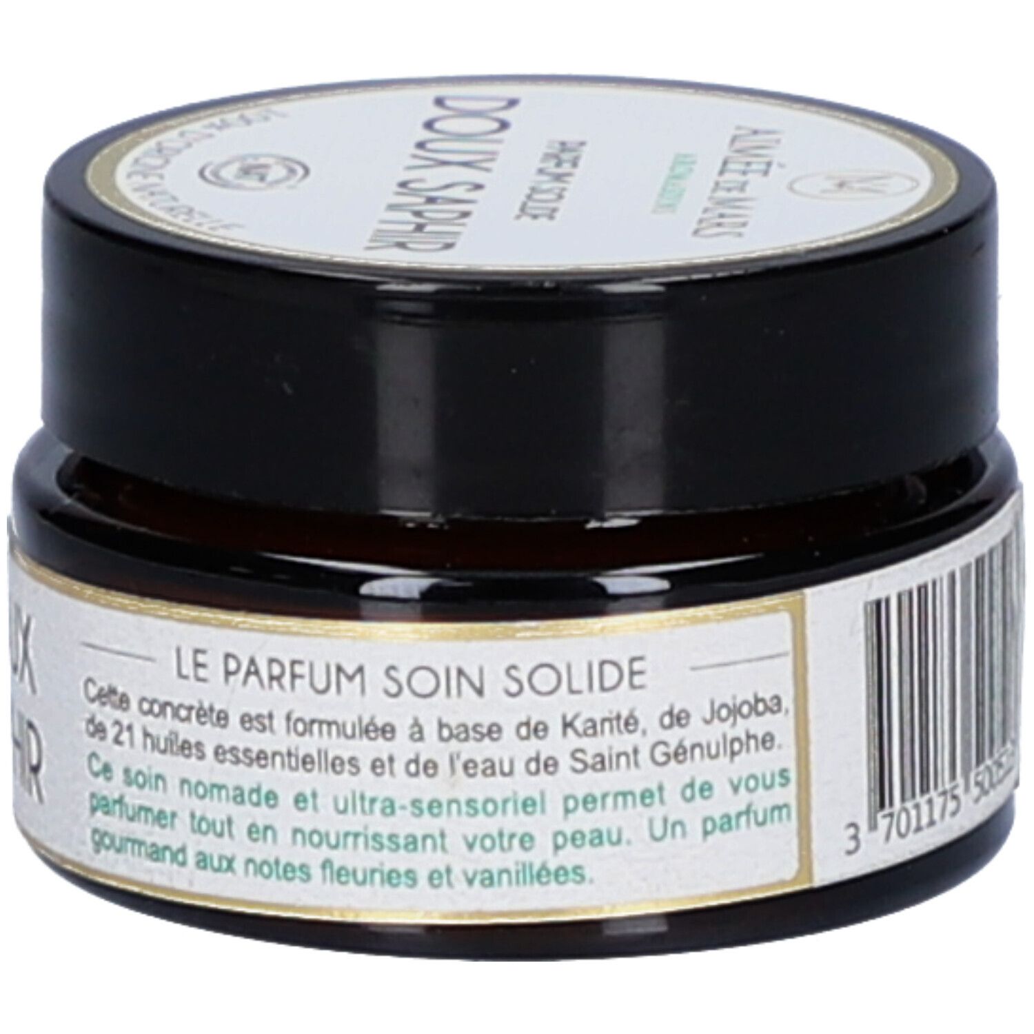 Petit pot rond avec couvercle noir. Inscription: Doux Saphir. Description du produit et ingrédients. Label Vegan.