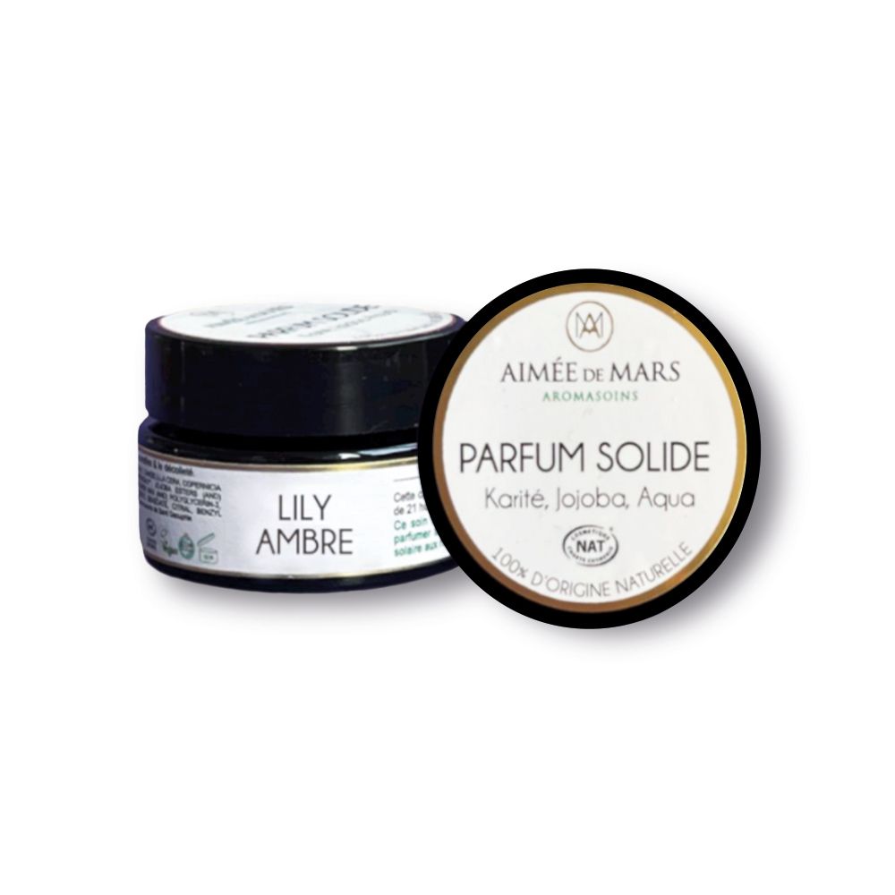 Kleines, rundes Tiegel mit schwarzem Deckel. Auf dem Deckel steht "LILY AMBRE" und "PARFUM SOLIDE".