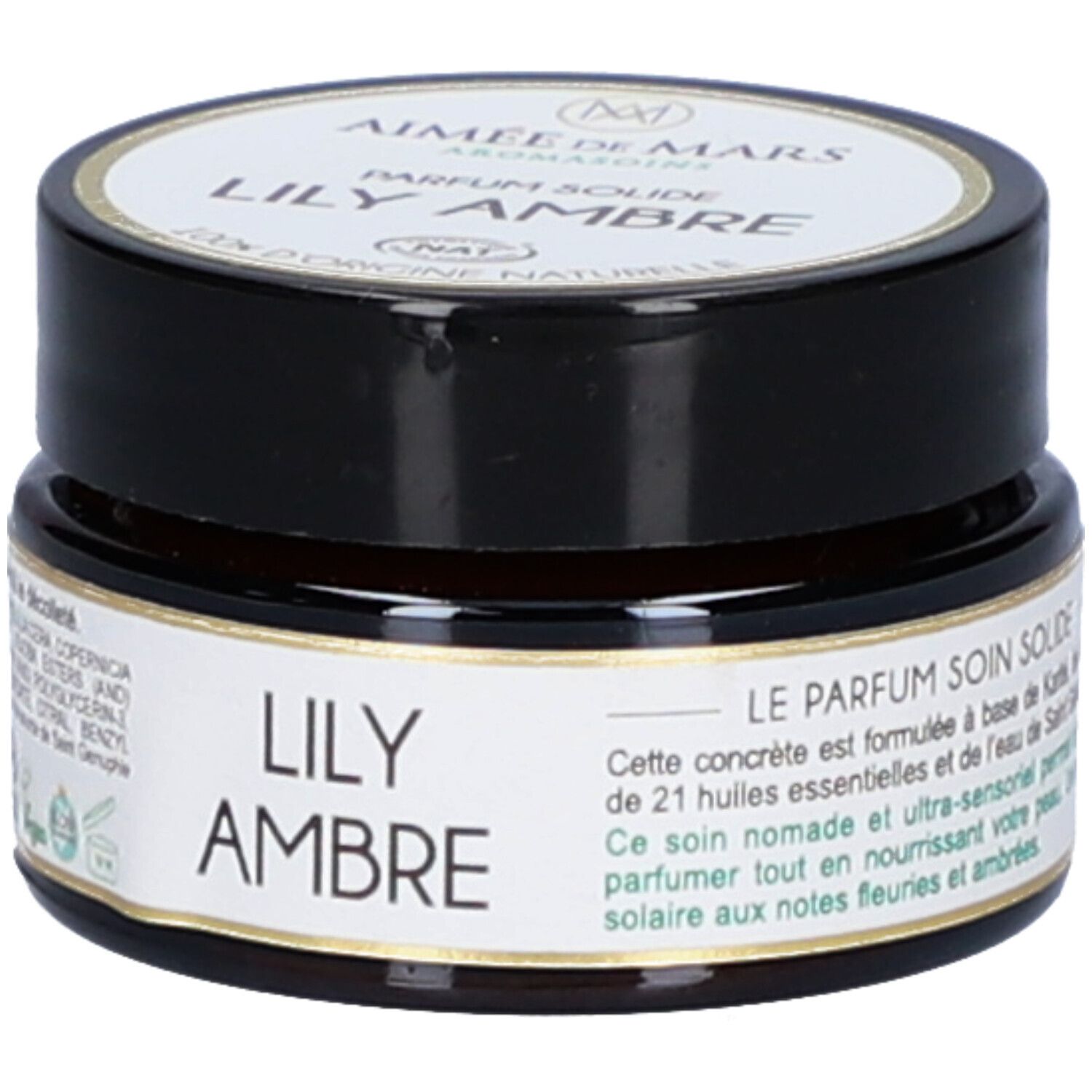 Pot en verre brun avec couvercle noir. Étiquette avec informations sur le produit. Inscription : Lily Ambre Parfum Solide. 21 huiles essentielles.