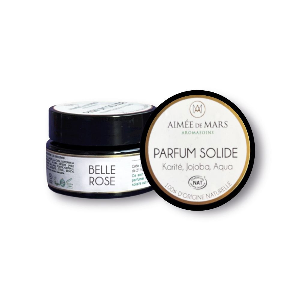 Petit pot avec couvercle noir. Sur le couvercle, "Belle Rose". À côté, un pot ouvert avec "Parfum Solide".