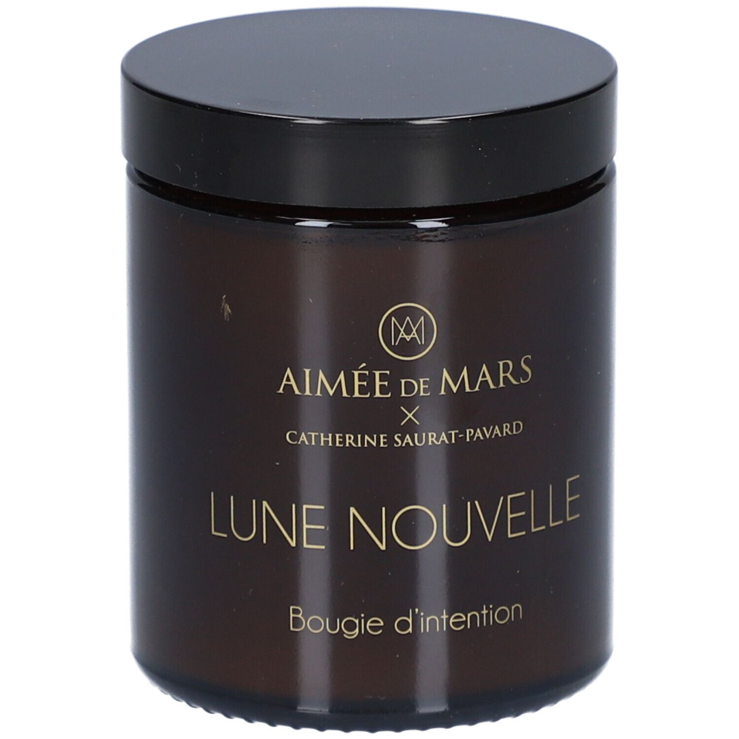 Pot en verre brun avec couvercle noir. Inscription : AIMÉE DE MARS x Catherine Saurat-Pavard, Lune Nouvelle, Bougie d'intention.