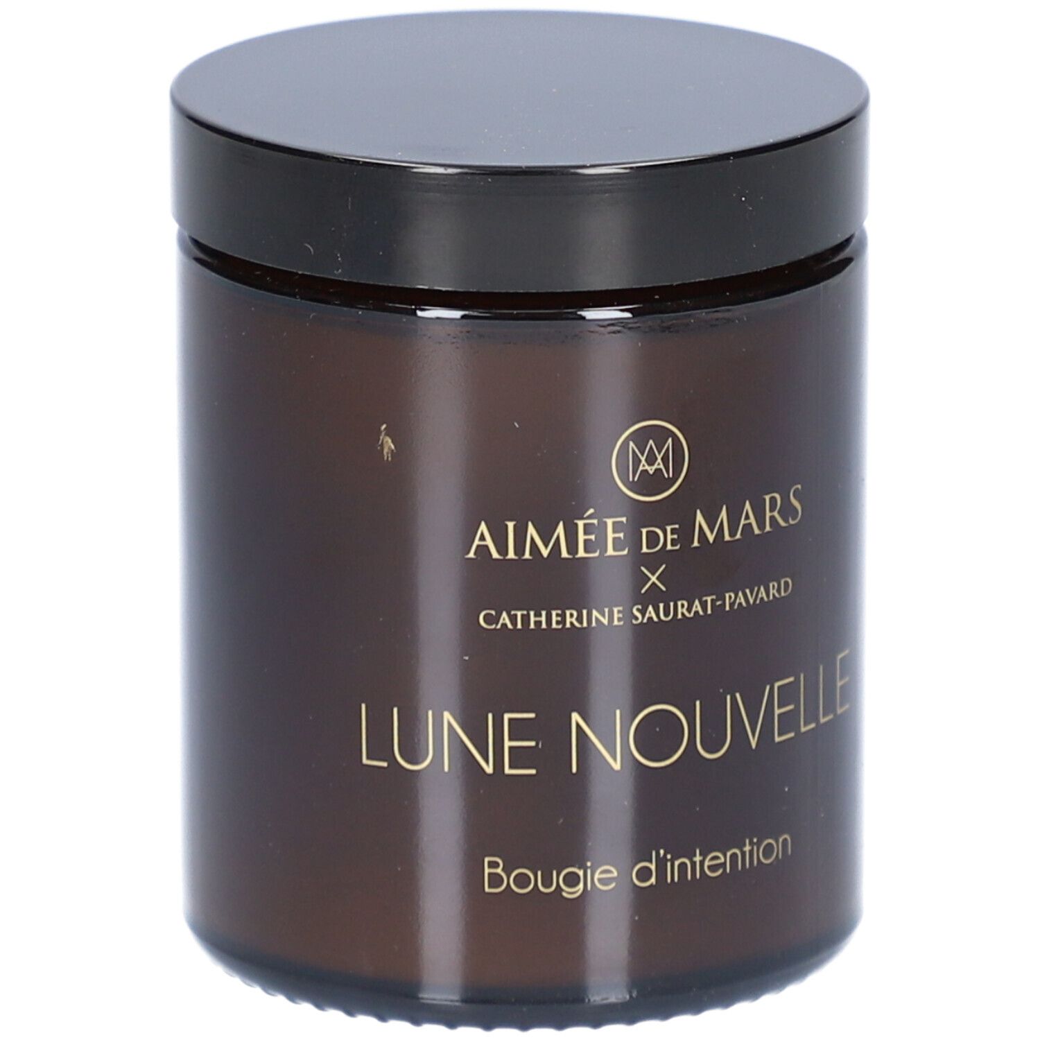 Pot en verre brun avec couvercle noir. Inscription : AIMÉE DE MARS x Catherine Saurat-Pavard, Lune Nouvelle, Bougie d'intention.