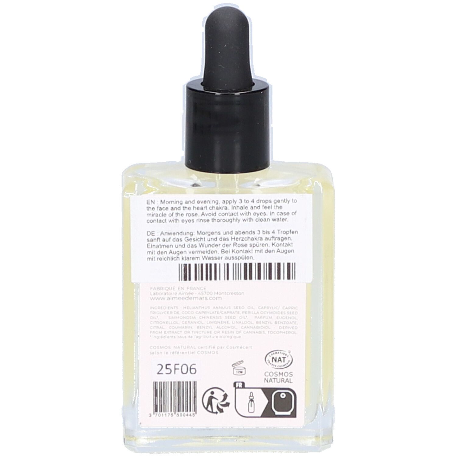 Rückseite der Glasflasche mit Text und Etikett. Enthält Informationen zur Anwendung und das Cosmos Natural-Siegel.
