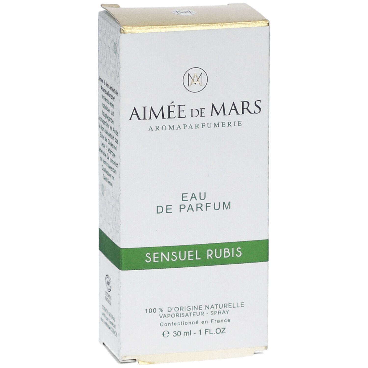 Verpackung von Eau de Parfum. Weiß mit grünen und goldenen Akzenten. Text: Sensuel Rubis, Eau de Parfum. Aimée de Mars.