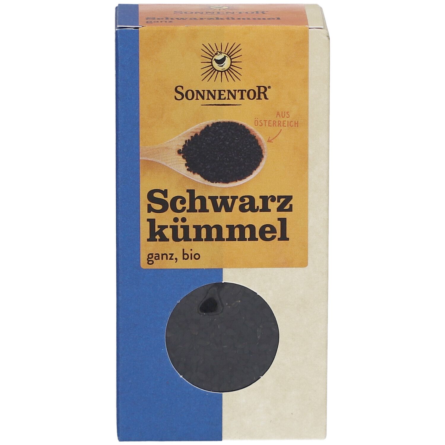 Boîte de graines de cumin noir. Marque SONNENTOR. Fenêtre. Texte : Schwarzkümmel ganz, bio.