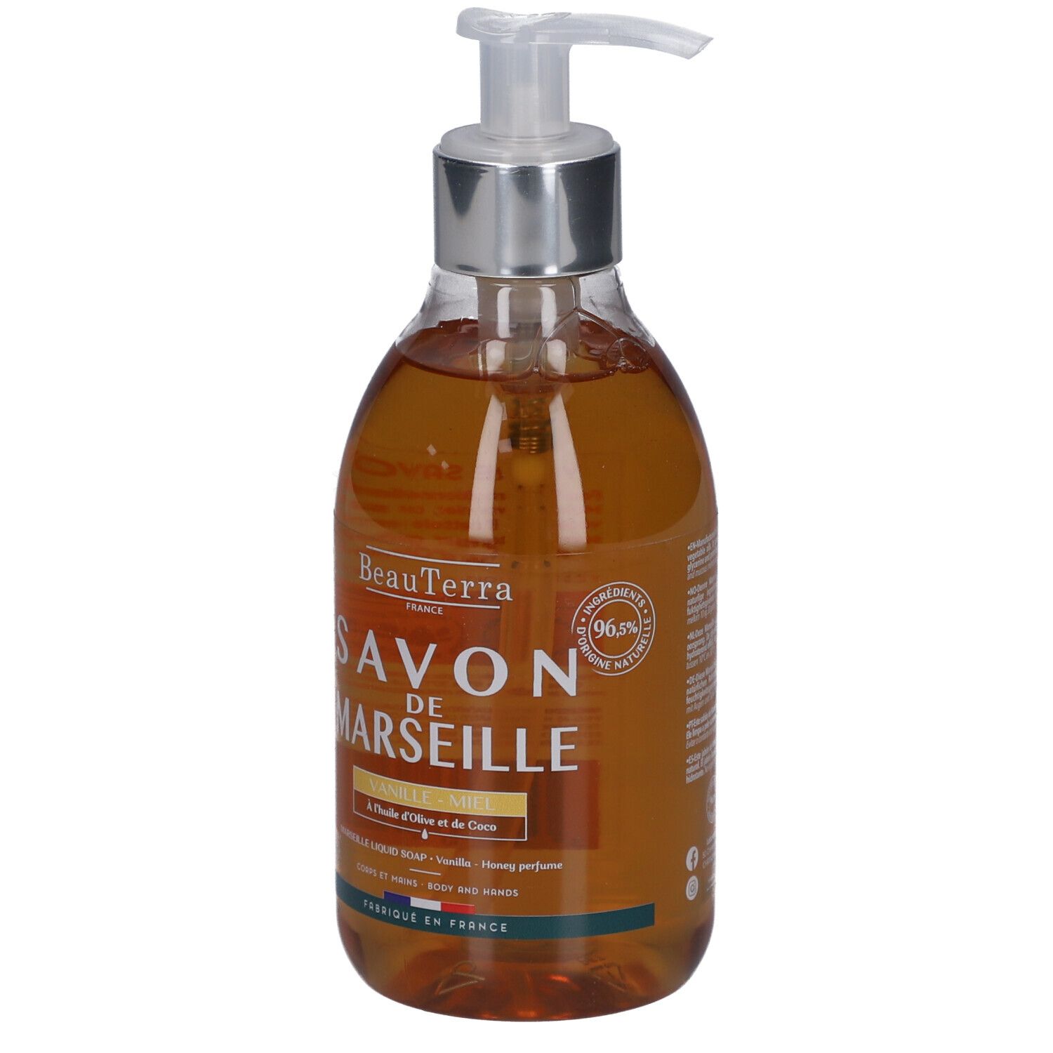 Savon liquide en flacon transparent avec pompe. Inscription: Savon de Marseille, Vanille Miel. Avec labels de qualité.