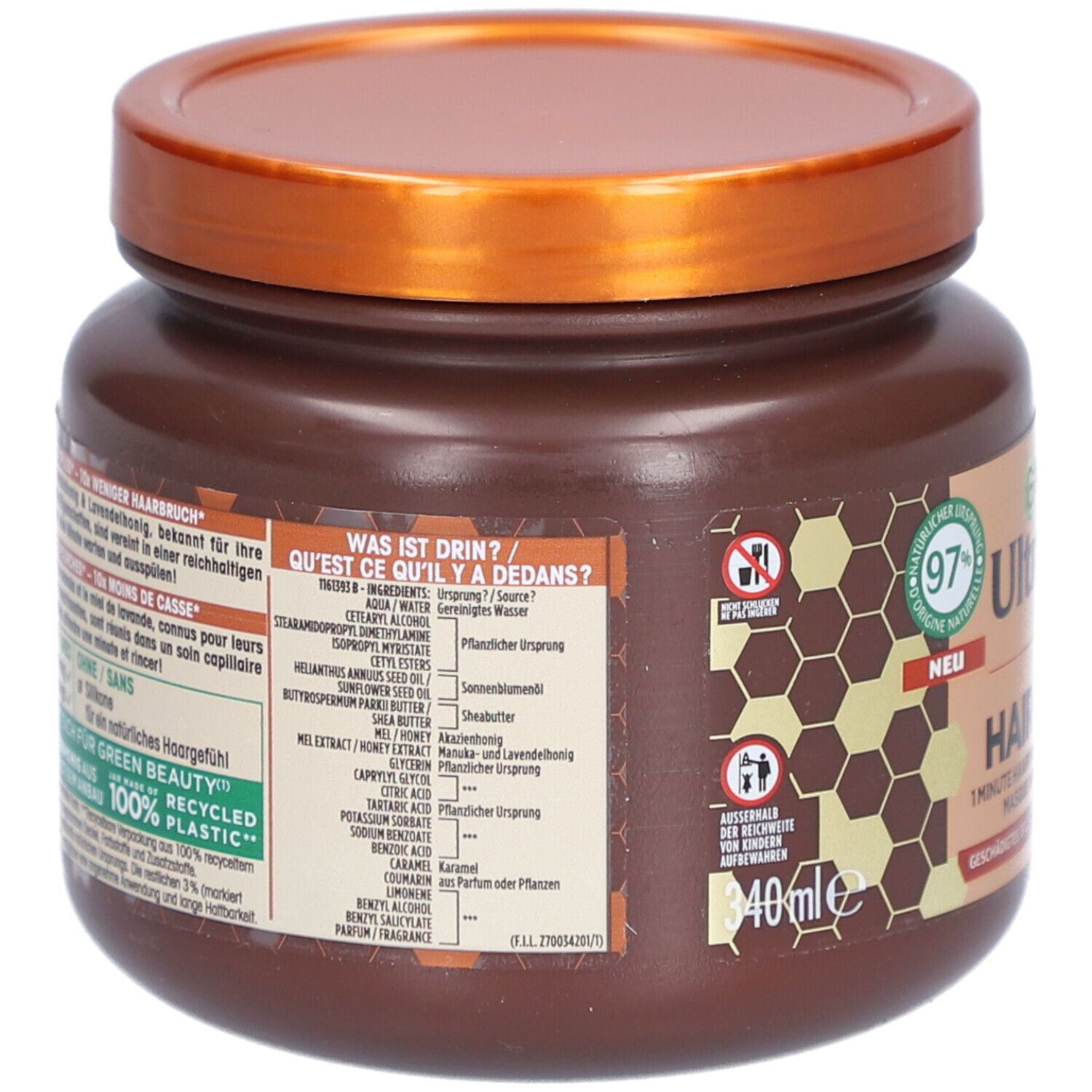 Dos du pot marron. Liste des ingrédients et informations sur le développement durable. Plastique 100% recyclé.