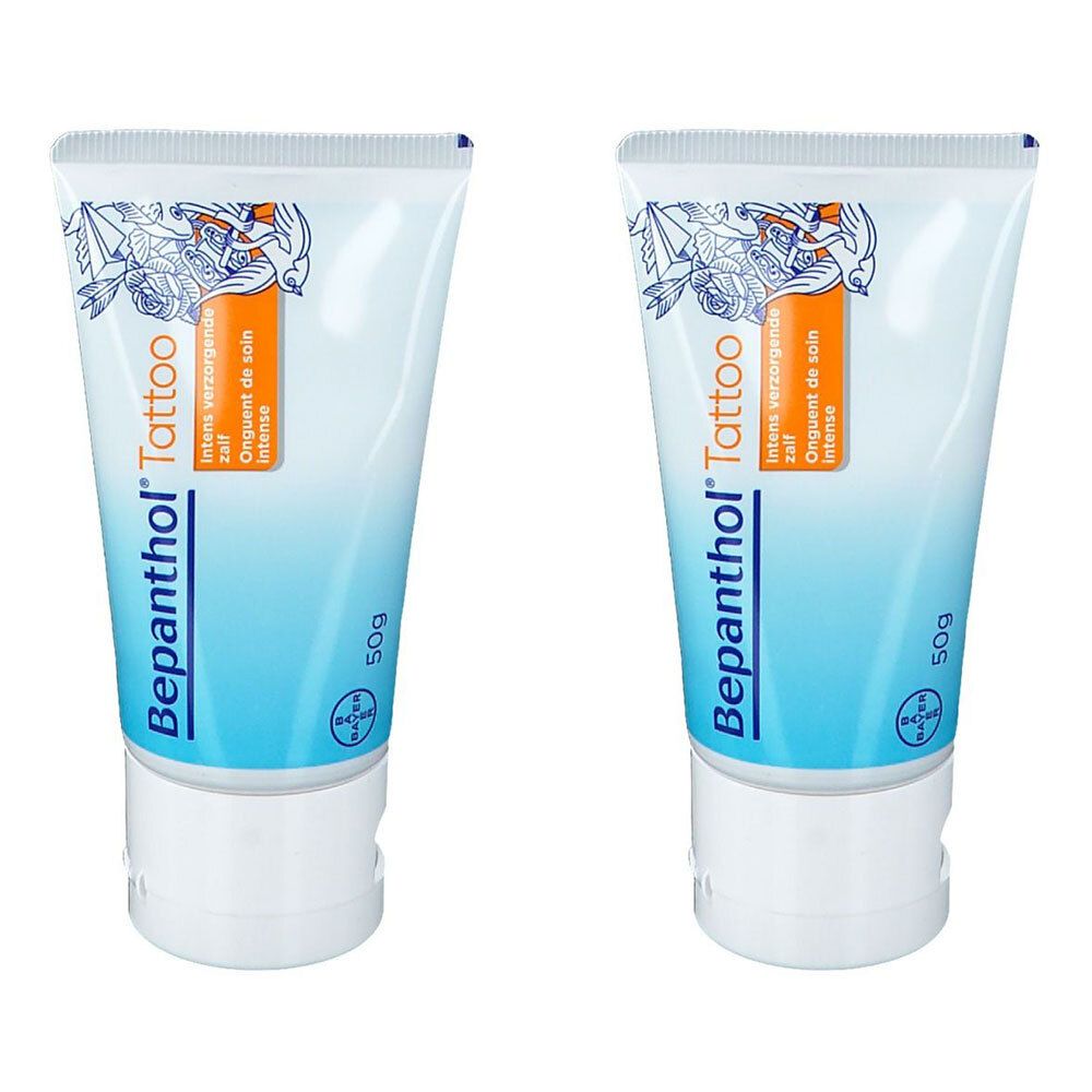 Zwei Tuben Bepanthol Tattoo. Weiße Tube mit blauem und orangefarbenem Design. Text: Intens verzorgend, Onguent de soin intense. 50g.