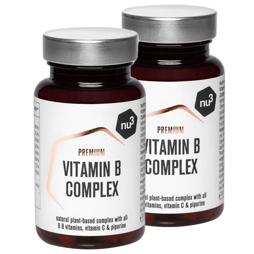 Zwei Flaschen nu3 Premium Vitamin B-Komplex. Braune Glasflaschen mit silbernen Deckeln und weißen Etiketten. Aufschrift: Vitamin B Komplex.