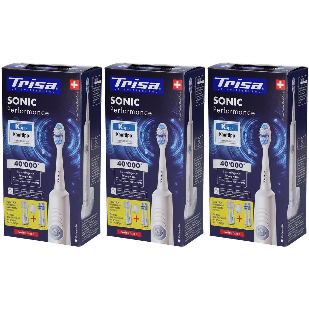 Gros plan de la brosse à dents TRISA Sonic Performance dans son emballage. La boîte montre la brosse à dents et les recharges.