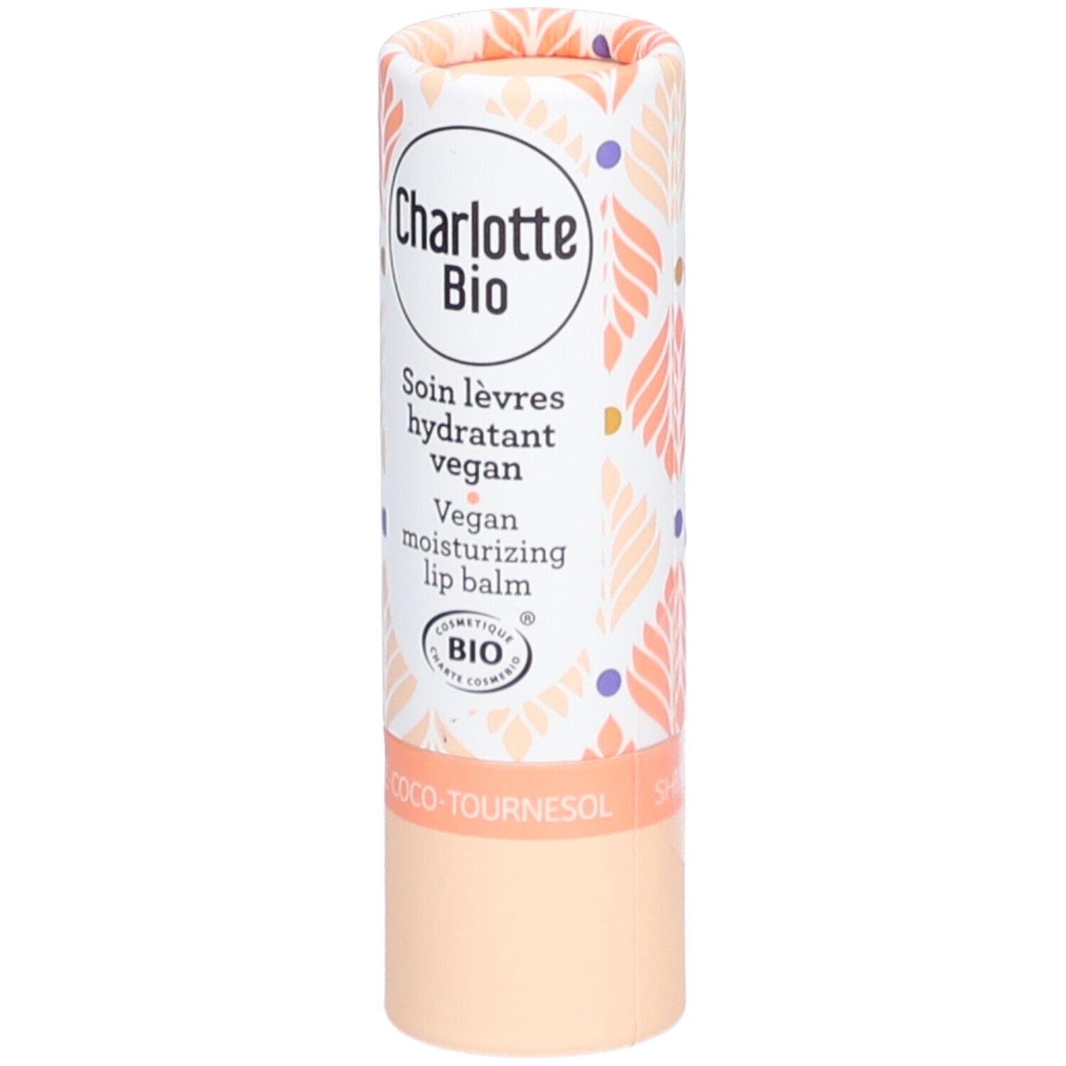 Emballage de baume à lèvres. Cylindrique, blanc avec motif floral. Inscription: Charlotte Bio, Soin lèvres hydratant vegan, Vegan moisturizing lip balm. Label BIO.