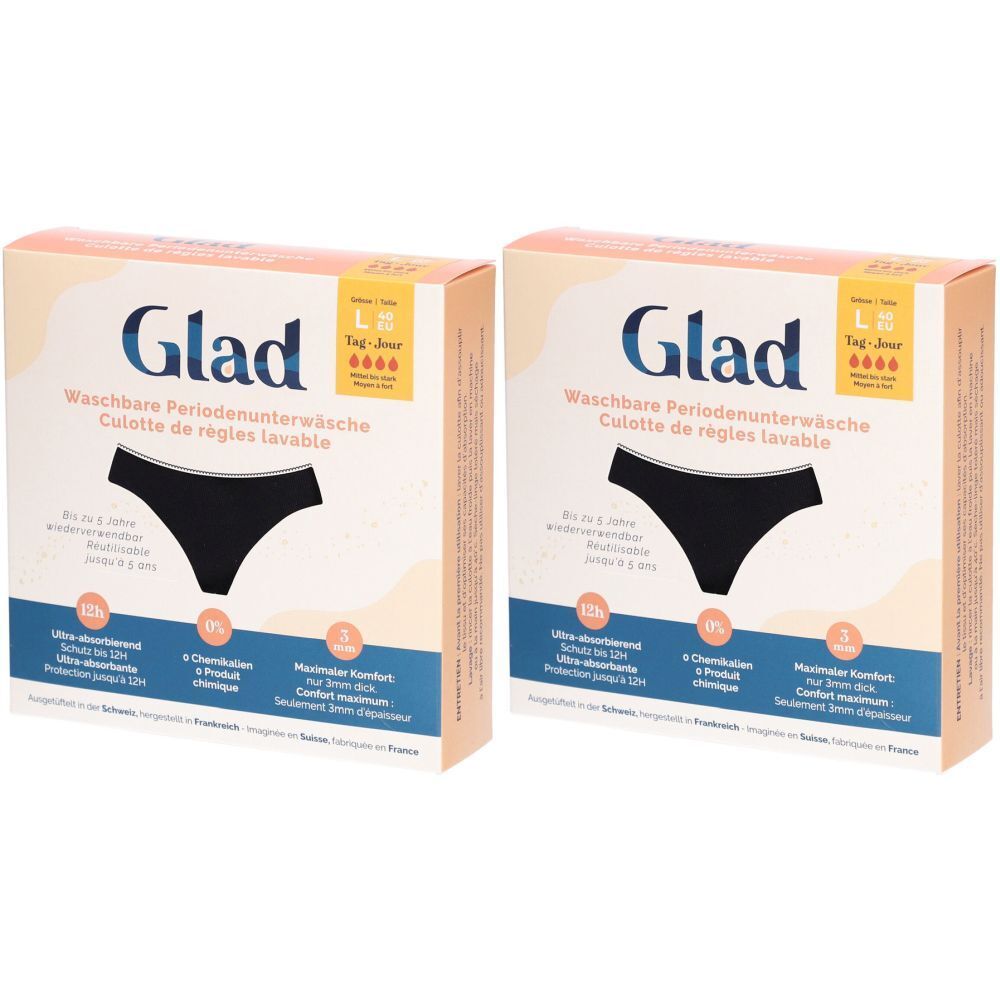 Deux boîtes de sous-vêtements menstruels Glad. Culotte noire représentée sur l'emballage. Texte : Culotte de règles lavable.