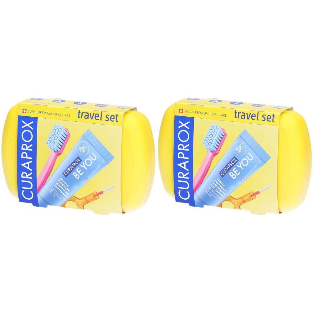 Gelbes CURAPROX Travel Set. Enthält Zahnbürste, Zahnpasta und Interdentalbürste. Verpackung mit Produktnamen und Logo.