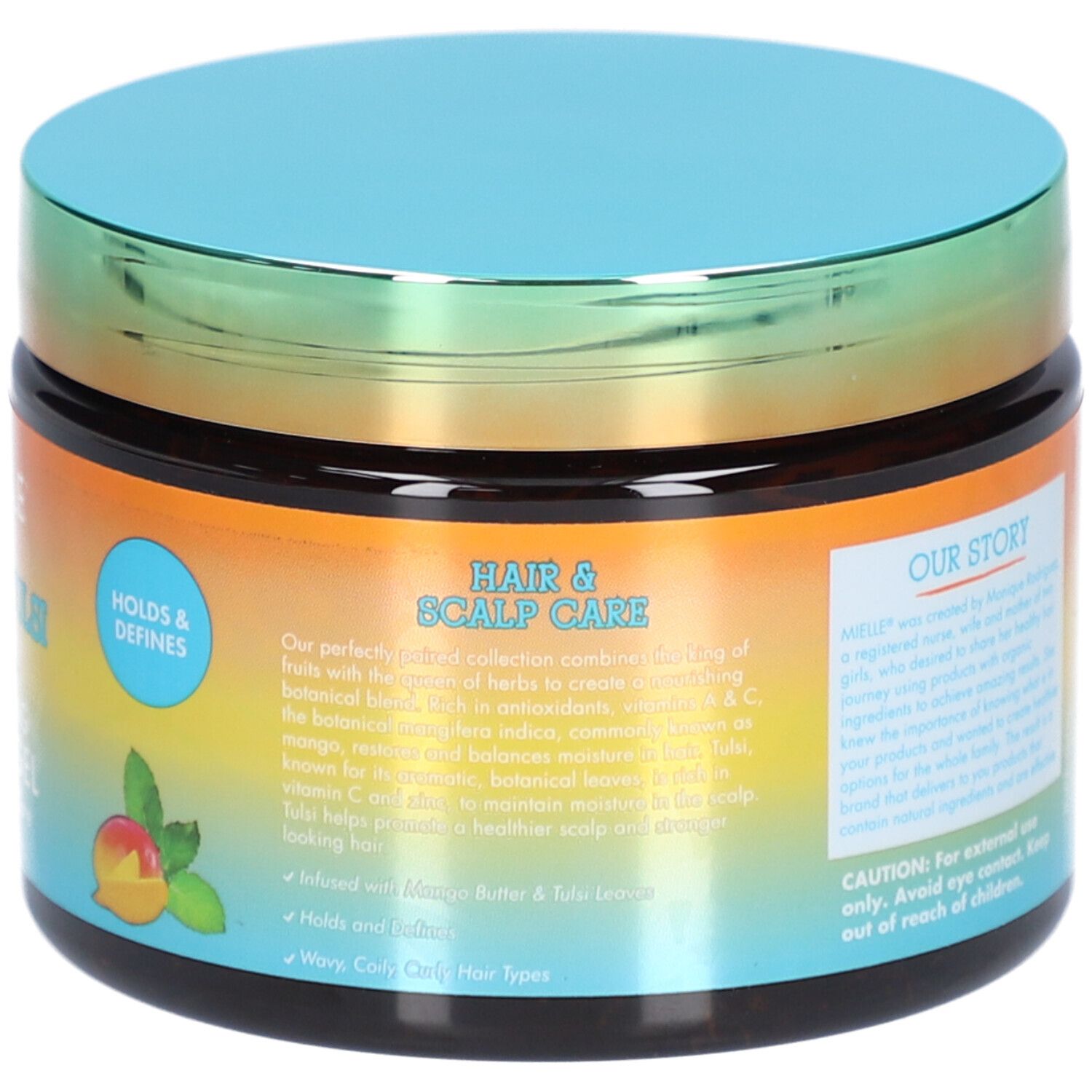 Dos du pot. Texte: Hair & Scalp Care, Notre histoire. Avec représentation de mangue et de feuilles.