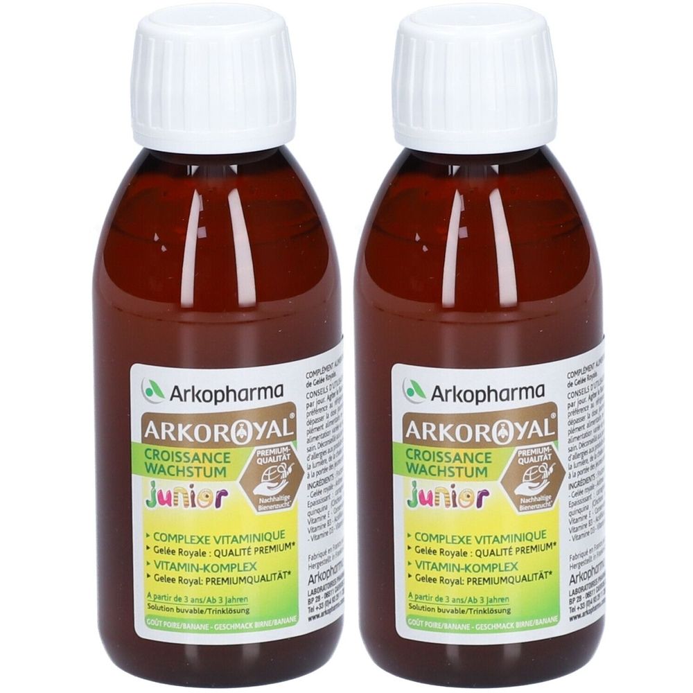 Deux flacons de liquide brun avec bouchons blancs. Étiquettes: Arkoroyal, Croissance, Junior.