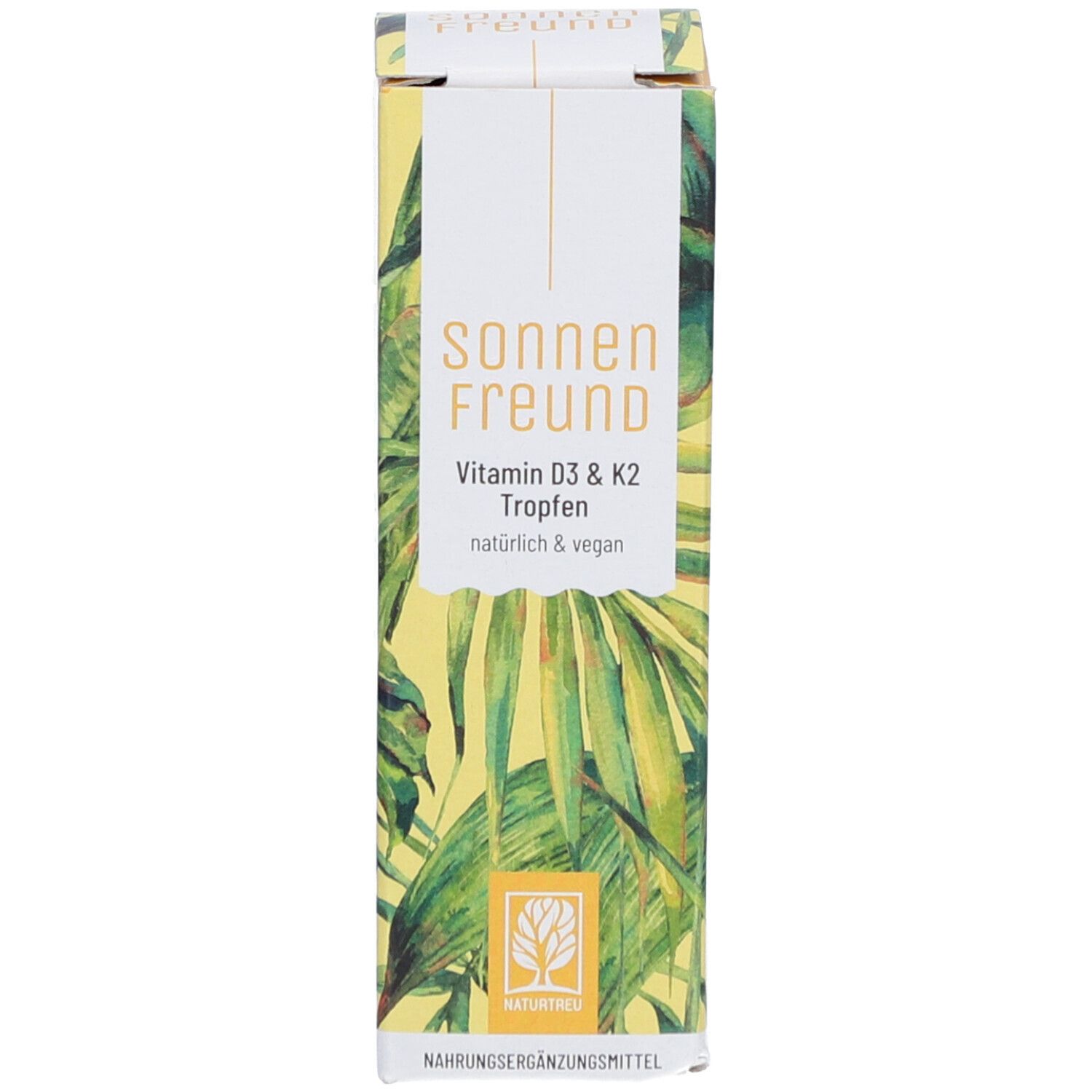 Schachtel mit Produktinformationen und Logo. Gelber Hintergrund mit grünen Blättern.