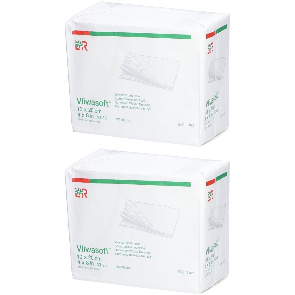 Zwei Packungen Vliwasoft Wundkompressen, 10 x 20 cm. Weiße Verpackung mit grün-roter Markierung und Produktbezeichnung.