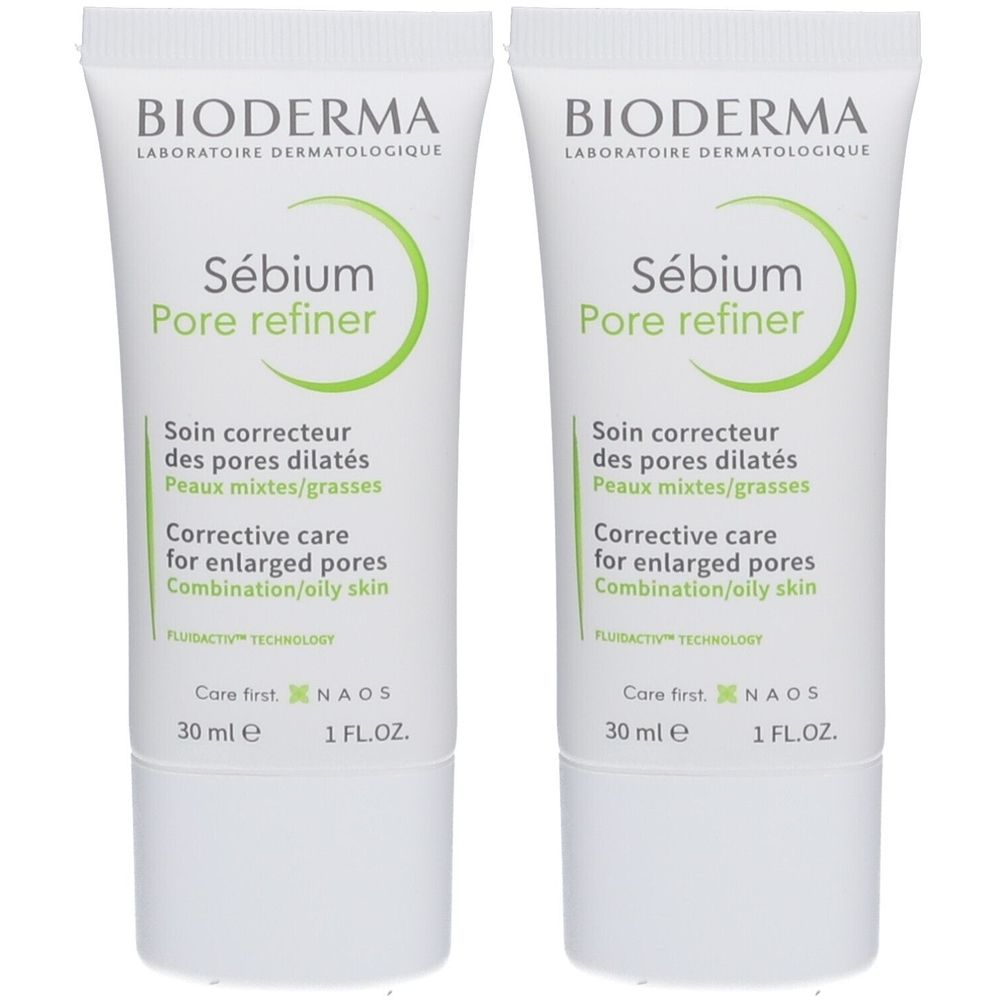 Deux tubes de BIODERMA Sébium Pore Refiner. Tubes blancs avec texte et logo verts. Soin correcteur des pores dilatés.