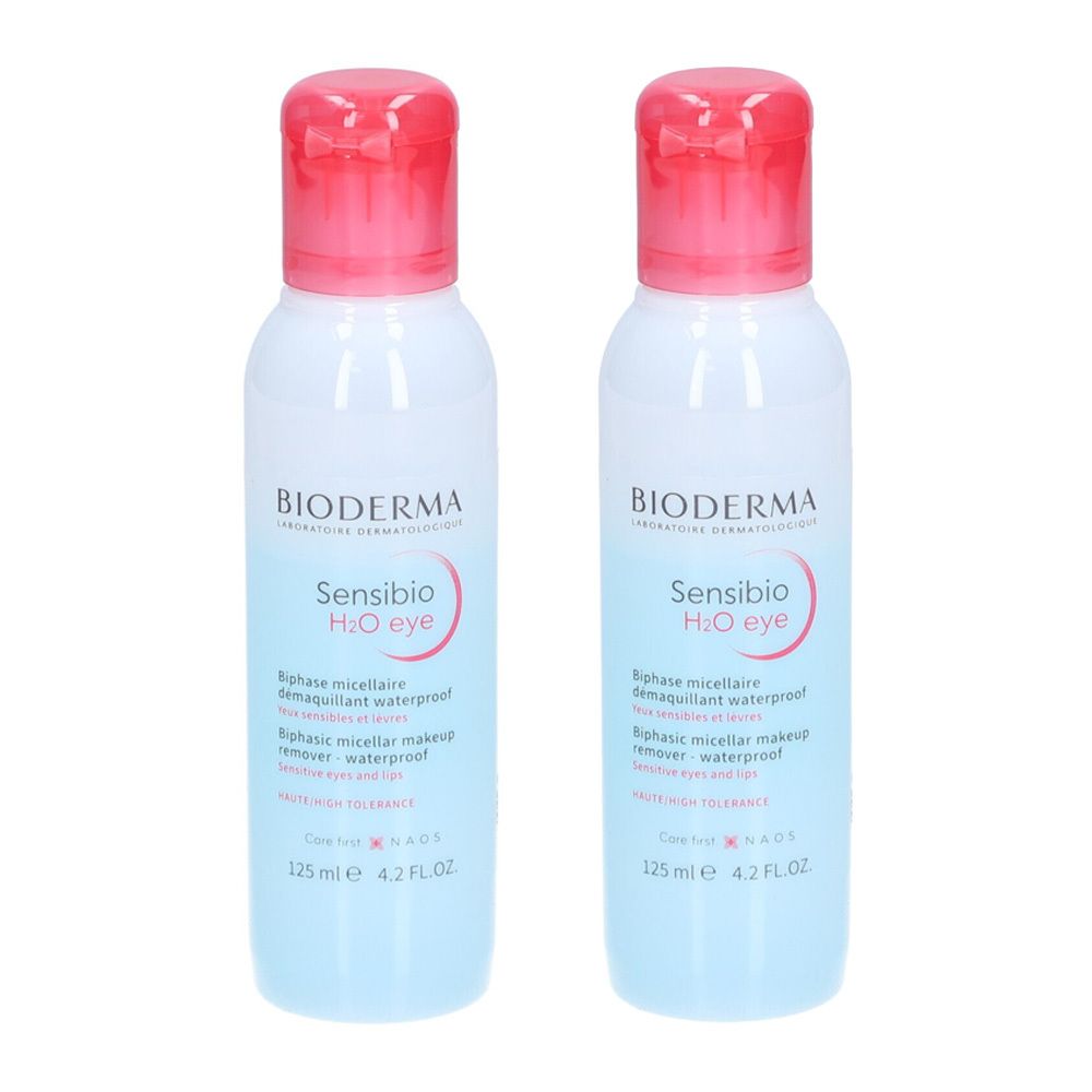 Zwei Flaschen BIODERMA Sensibio H2O eye. Weiße Flaschen mit rosa Deckel. Aufschrift Sensibio H2O eye. 125 ml.