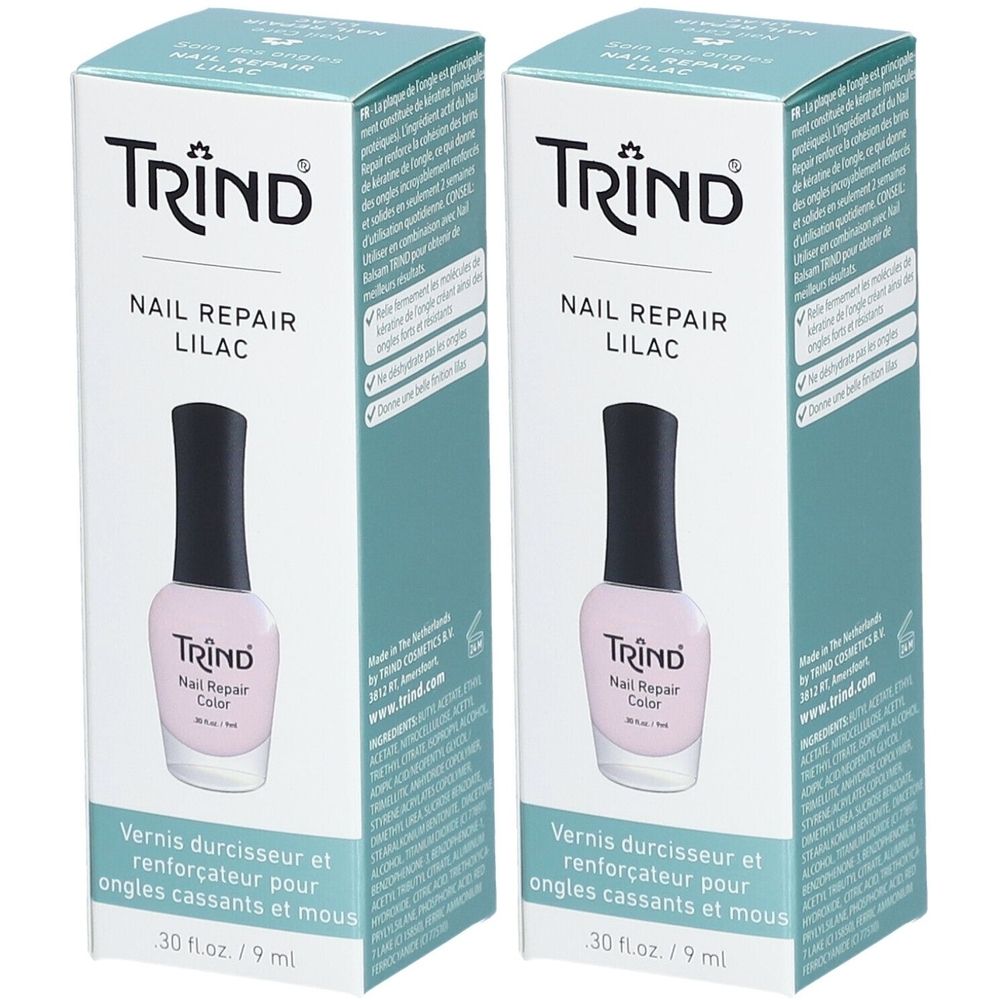 Zwei Schachteln mit Nagellack. Aufschrift: TRIND Nail Repair Lilac. Flaschen mit schwarzem Deckel und rosa Inhalt.