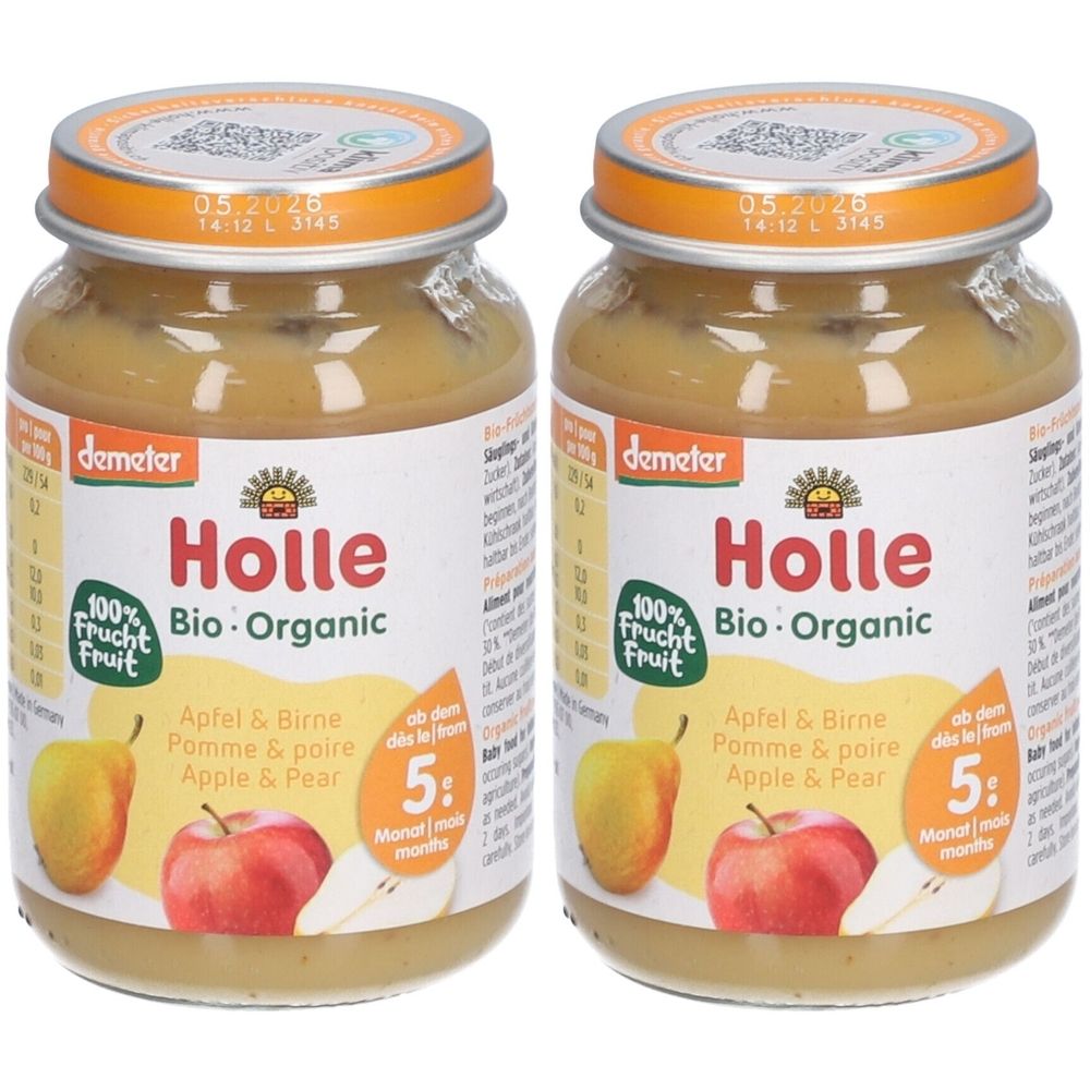 Deux pots de nourriture pour bébé Holle Bio-Organic Pomme & Poire. Pots avec bouchon à vis, étiquette avec logo, fruits et texte. Date de péremption.
