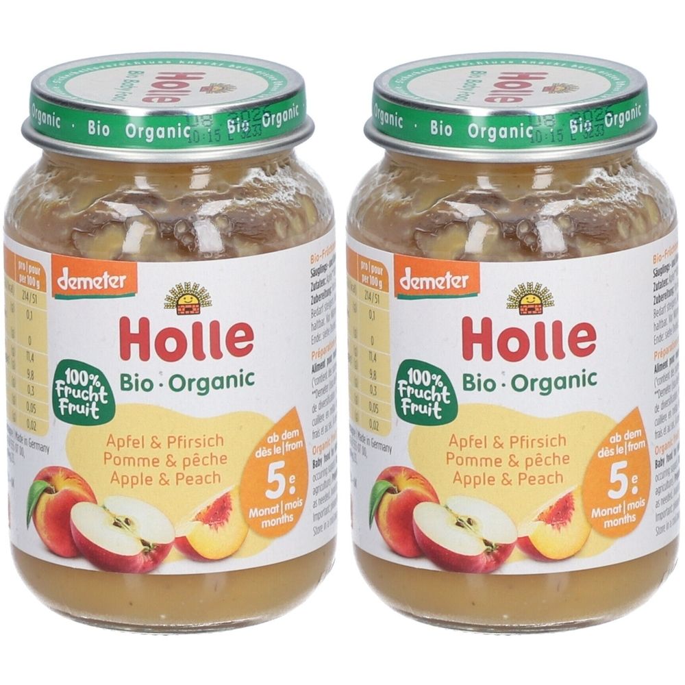 Zwei Gläser Babynahrung mit Apfel-Pfirsich-Geschmack. Aufschrift: Holle Bio-Organic, 100% Frucht. Demeter-Siegel. Geeignet ab 5 Monaten.