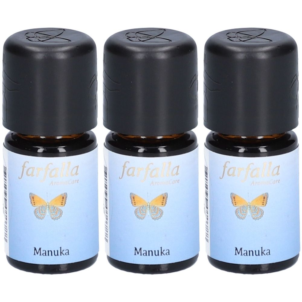 Trois petites bouteilles avec bouchons noirs. Étiquettes avec "farfalla", un papillon et "Manuka".