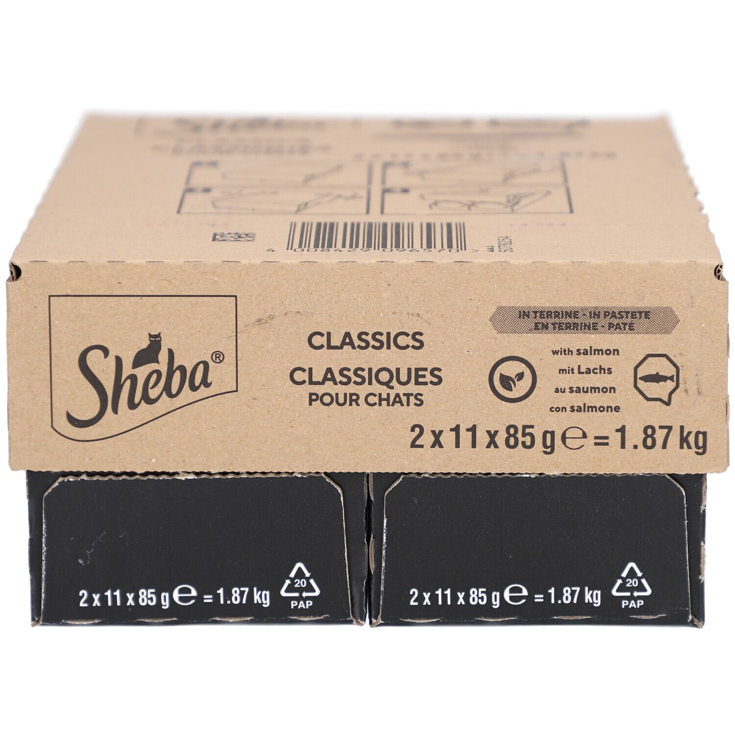 Katzenfutter in einer achteckigen Schale. Aufschrift "Sheba Classics". Enthält Lachs. Mit Illustration einer Katze und Fisch-Logo. 85g.