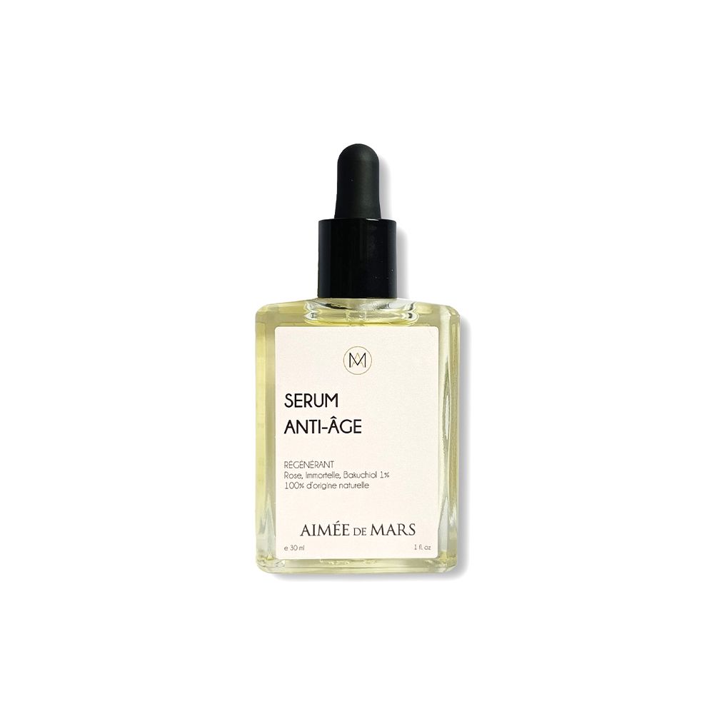 Klarer Glasflakon mit schwarzer Pipette. Etikett mit "SERUM ANTI-ÂGE" und "AIMÉE DE MARS".