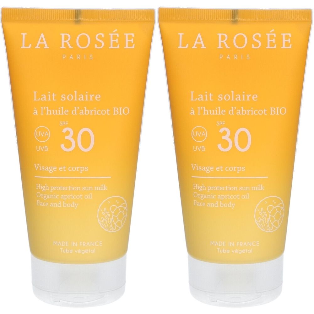 Zwei Tuben Sonnenmilch. Gelbe Verpackung mit weißer Schrift. Aufschrift: Lait solaire SPF 30, für Gesicht und Körper.