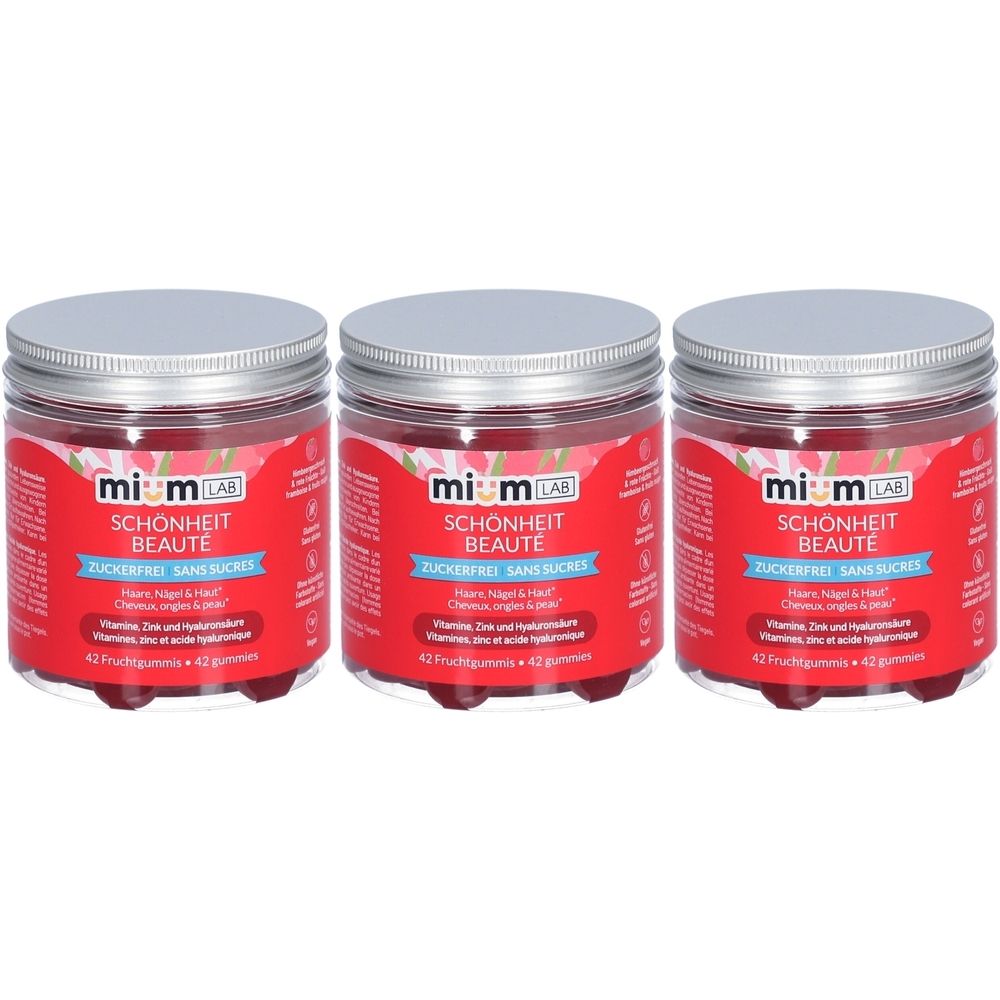 Drei Gläser miumLAB Gummies Schönheit. Rote Etiketten mit Produktnamen und Inhaltsstoffen. Silberne Deckel.