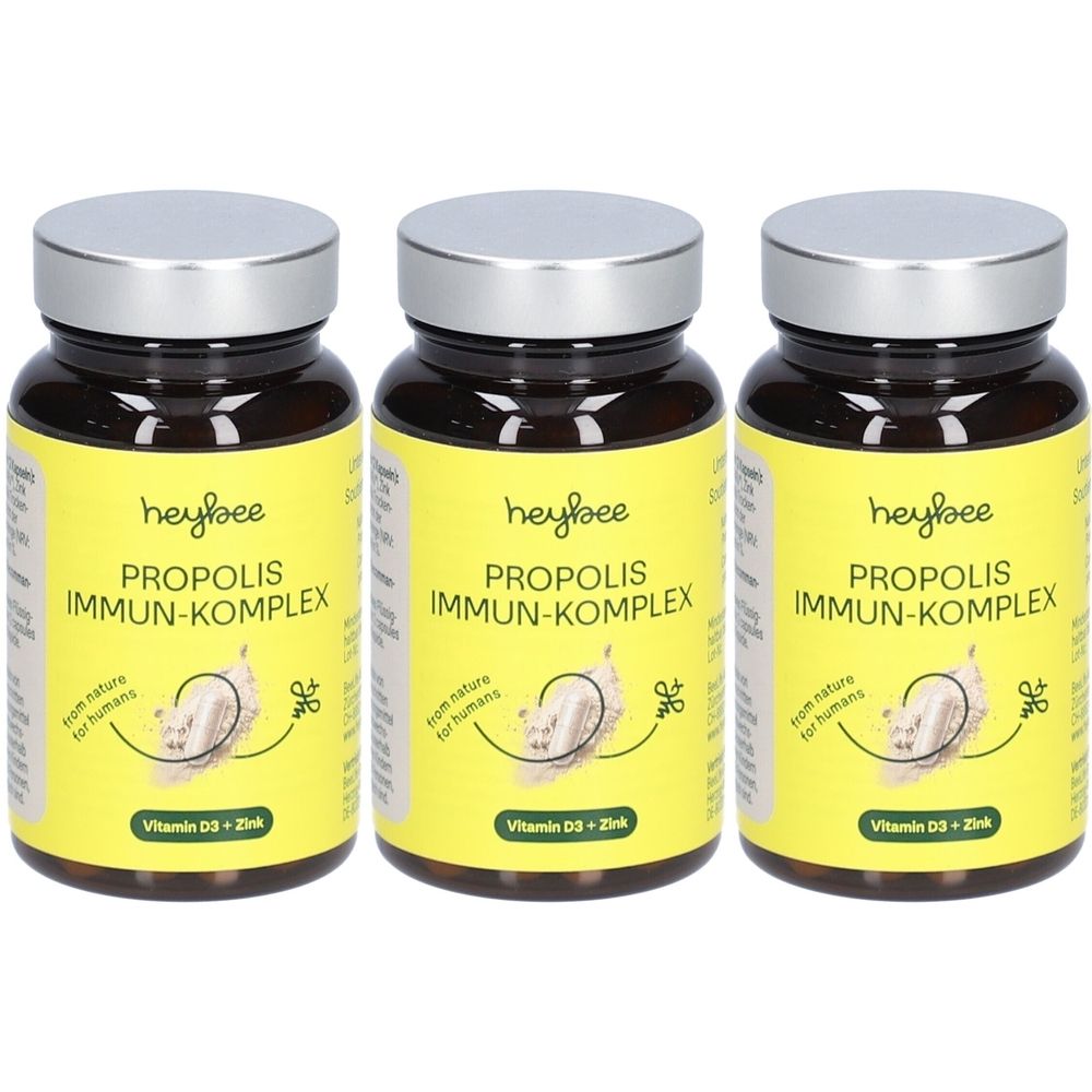 Drei braune Glasflaschen mit silbernen Deckeln. Auf gelben Etiketten steht "heybee PROPOLIS IMMUN-KOMPLEX".