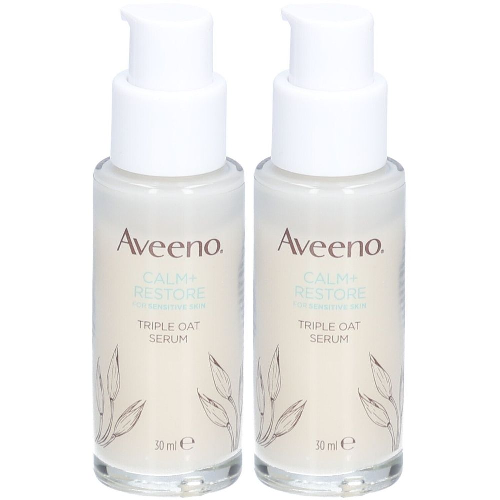 Zwei Flaschen Aveeno Calm+Restore Serum. Weiße Pumpköpfe auf durchsichtigen Flaschen. Text: Triple Oat Serum, 30 ml.