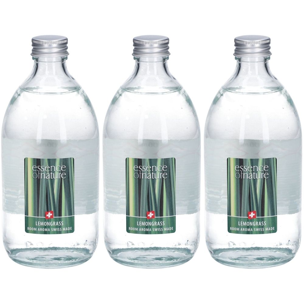 Drei Glasflaschen mit silbernen Verschlüssen. Etiketten mit "essence of nature" und Lemongrass-Logo. Schweizer Kreuz.