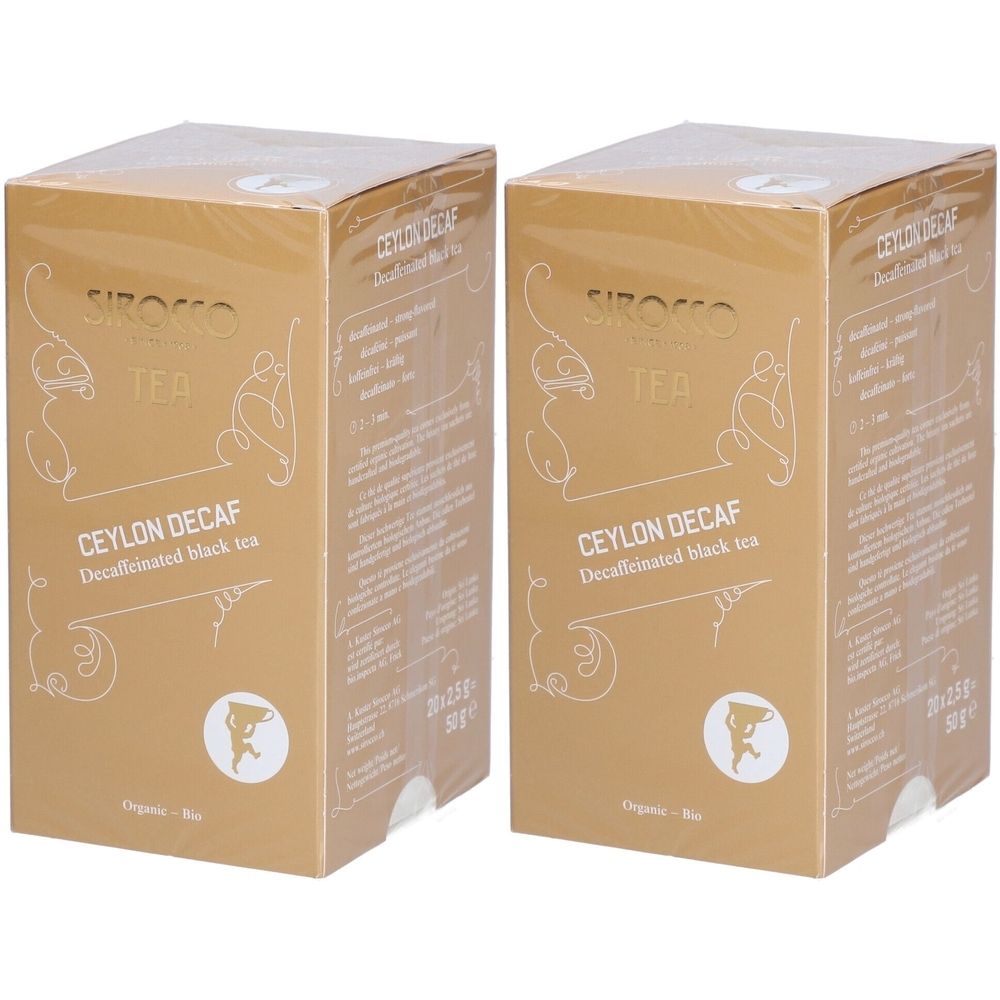 Deux boîtes dorées avec "Sirocco Tea Ceylon Decaf". Inscription "Decaffeinated black tea". Emballage en plastique transparent.