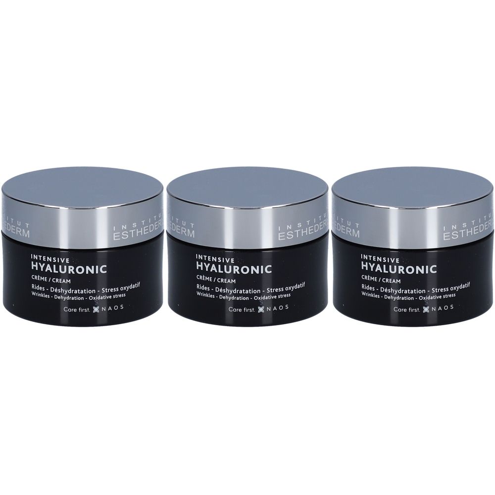 Drei schwarze Tiegel mit silbernen Deckeln. Auf den Tiegeln steht "INTENSIVE HYALURONIC CREME/CREAM" und "INSTITUT ESTHEDERM".